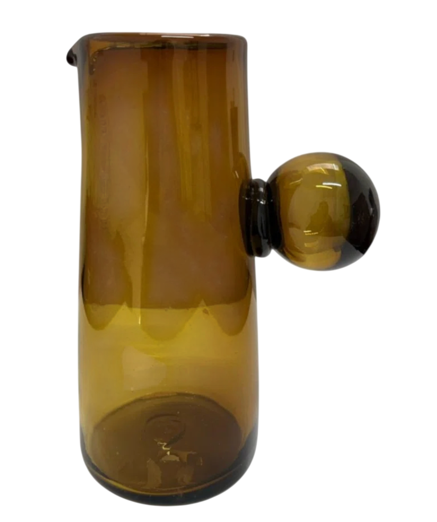 Pitcher in amber color. Handblown in Guadalajara Mexico.