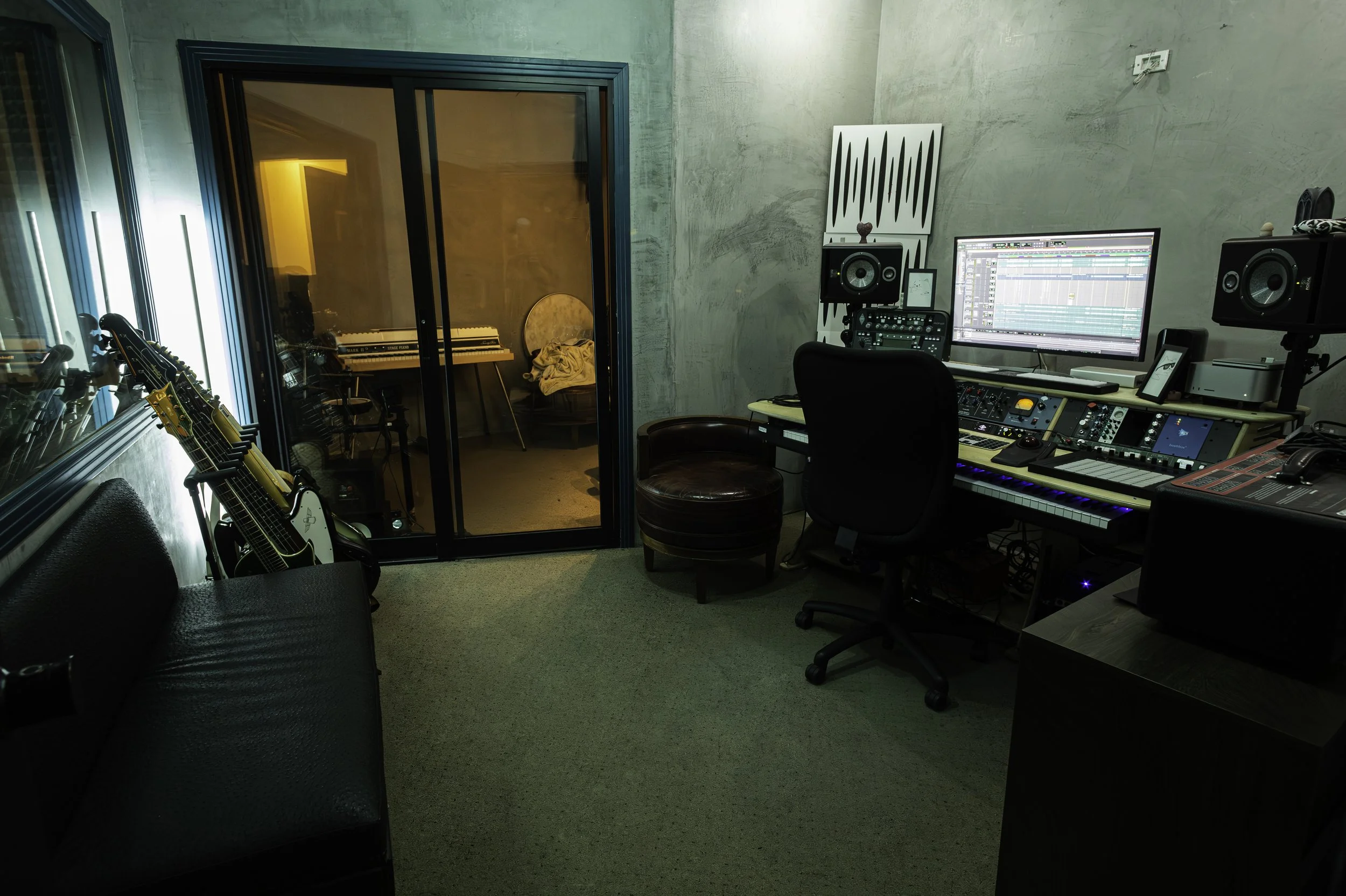 El Segundo professional recording studio rental with isolation booth, Apollo audio interface, Rhodes keyboard, and premium mixing gear. Perfect for podcasts, music production, and vocal sessions.