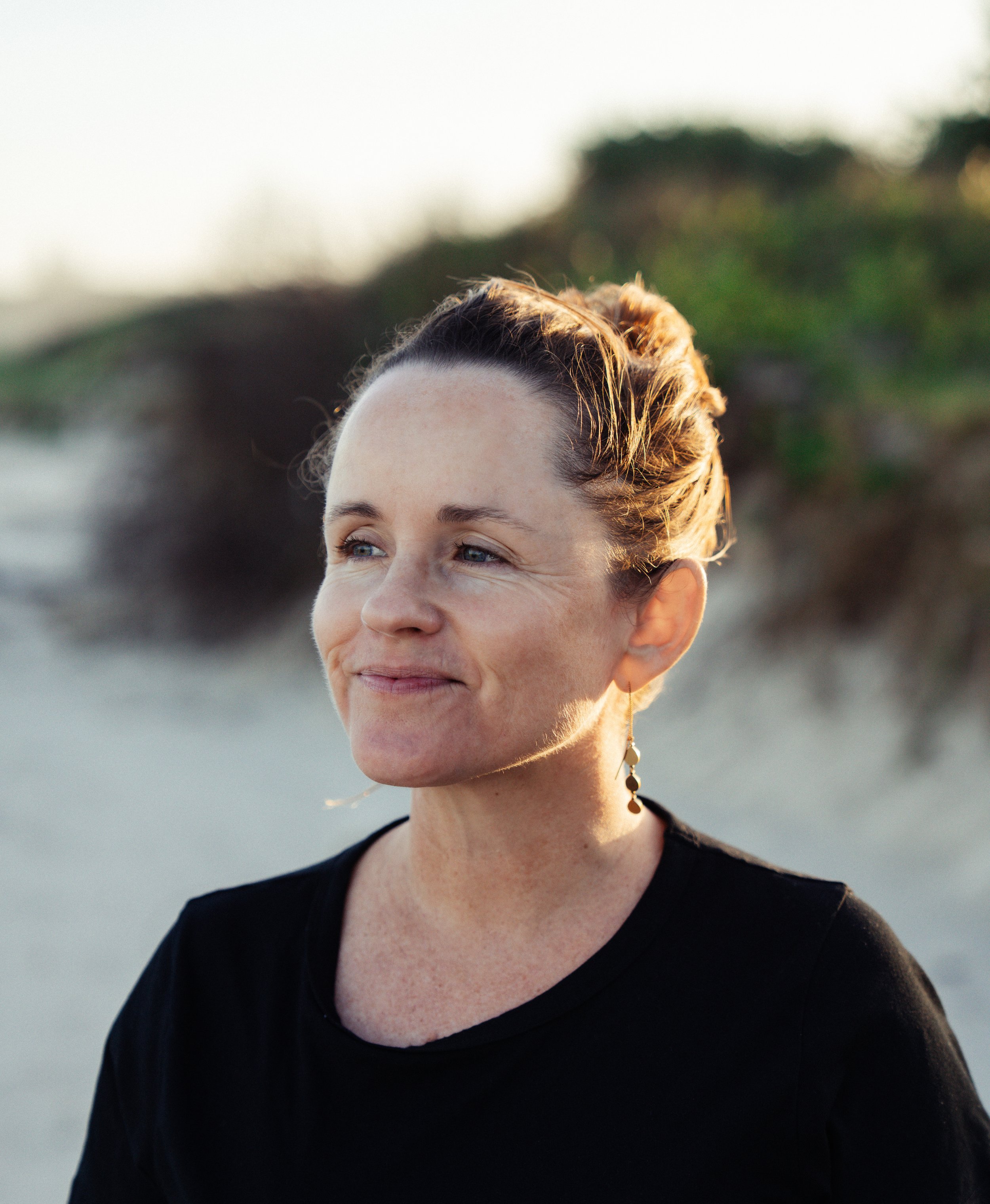 Fiona MacLeod on Angels beach in Ballina at sunset