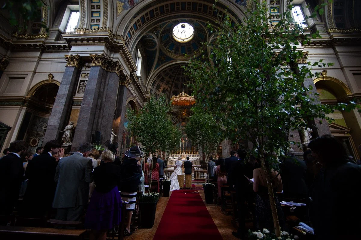 Bride and groom exchanging vows during a Spanish destination wedding