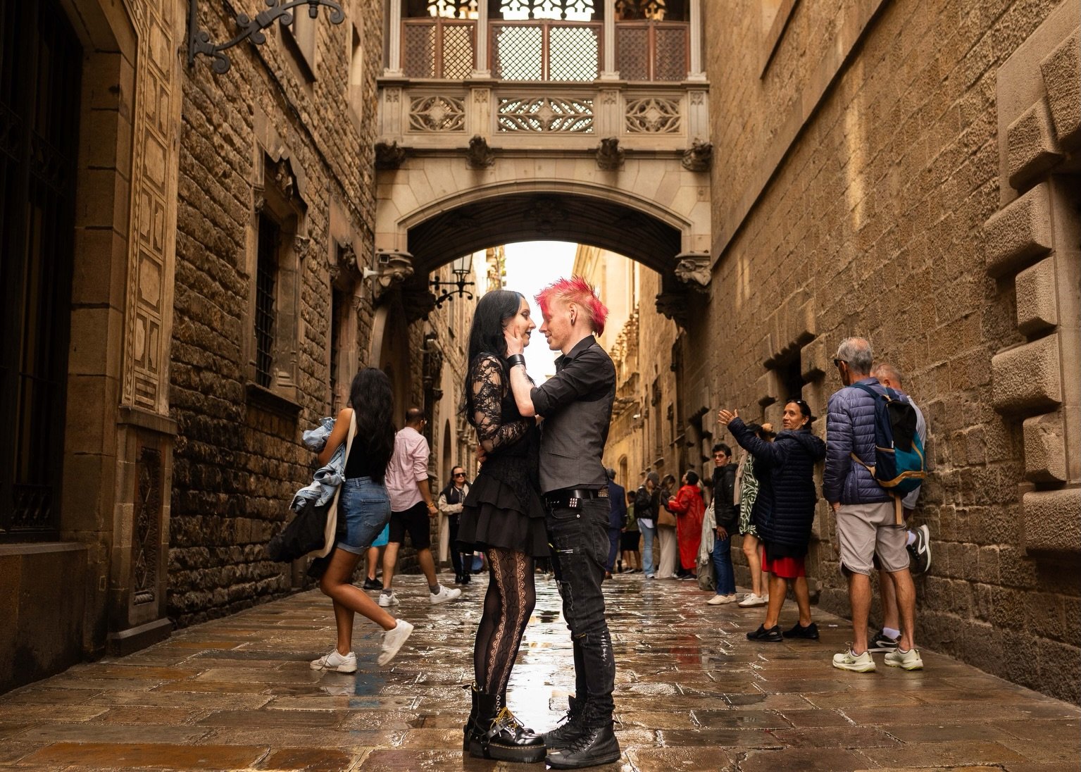 Such a beautiful couple and such an incredible setting ❤️

Even though it had been raining, we found some beautiful places in the Gothic area in Barcelona to take some incredible and romantic couple photo shoot.