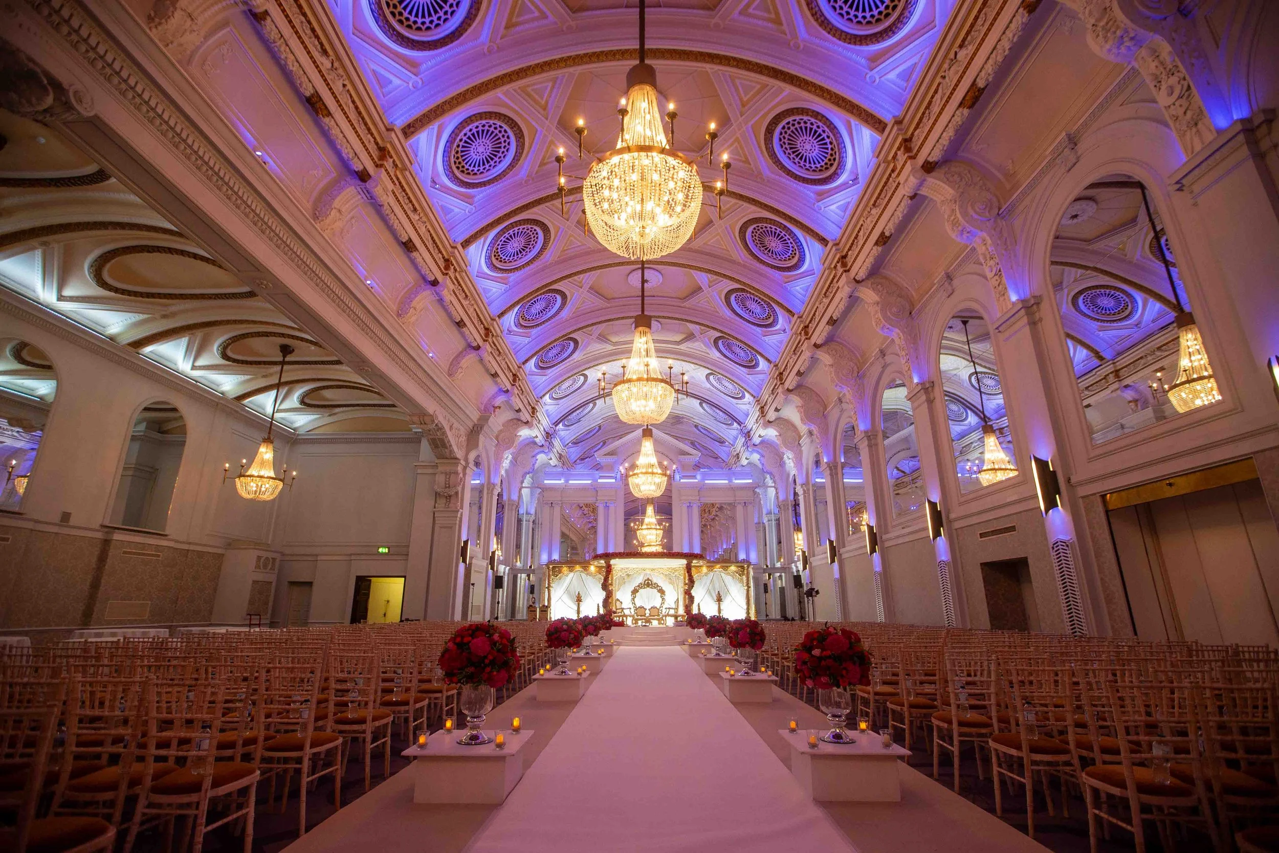 UK couple signing wedding insurance documents for destination wedding in Spain