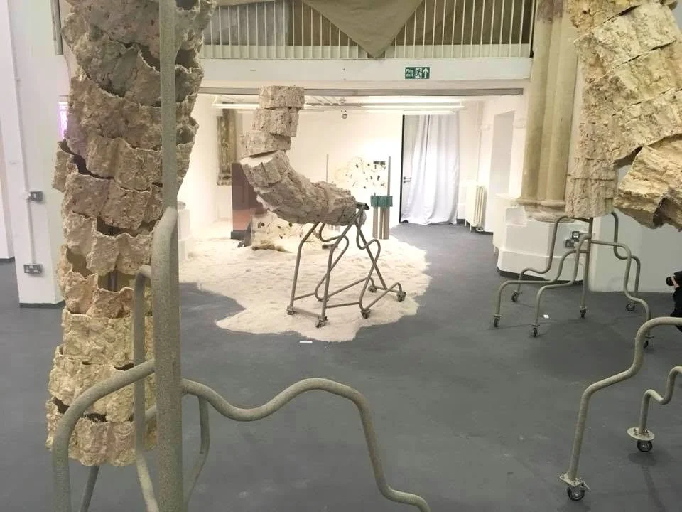 Lot's Wife, 2018. Jesmonite, fibre glass, bricks, mirrors, trolley wheels, metal bars, spray paint, acrylic sheet, bricks, salt— Variable dimensions