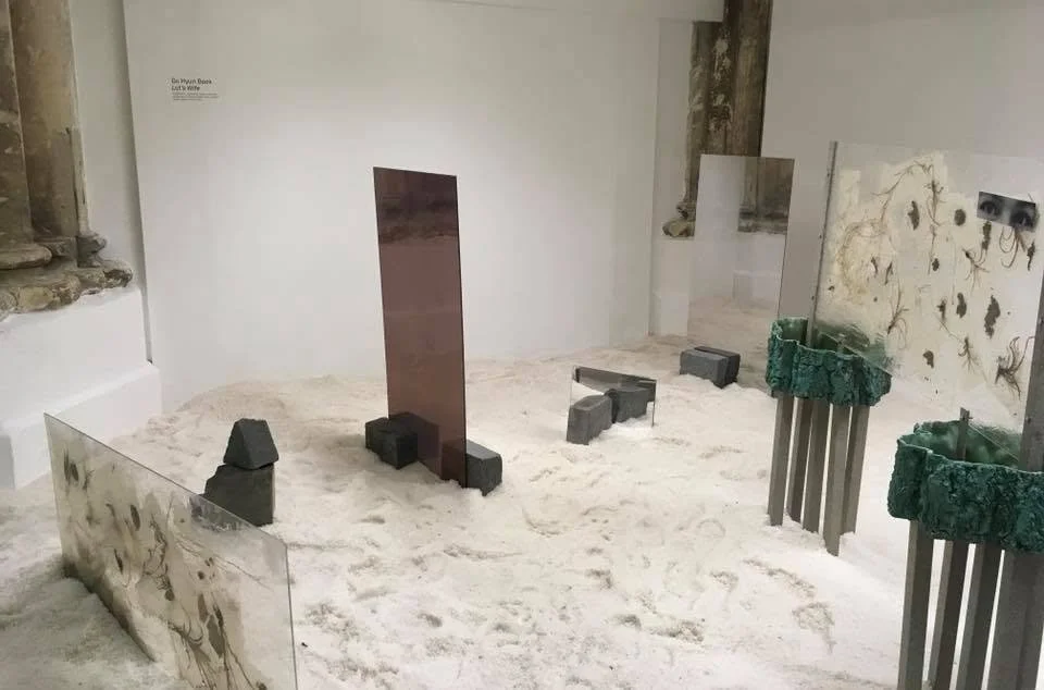 Lot's Wife, 2018. Jesmonite, fibre glass, bricks, mirrors, trolley wheels, metal bars, spray paint, acrylic sheet, bricks, salt— Variable dimensions