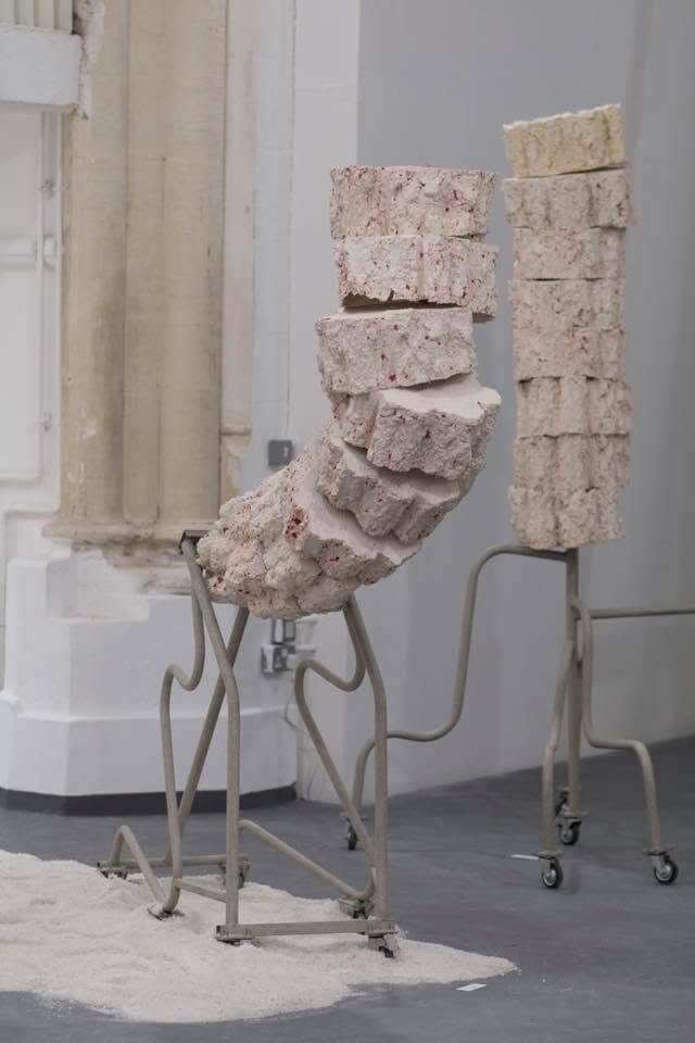 Lot's Wife, 2018. Jesmonite, fibre glass, bricks, mirrors, trolley wheels, metal bars, spray paint, acrylic sheet, bricks, salt— Variable dimensions