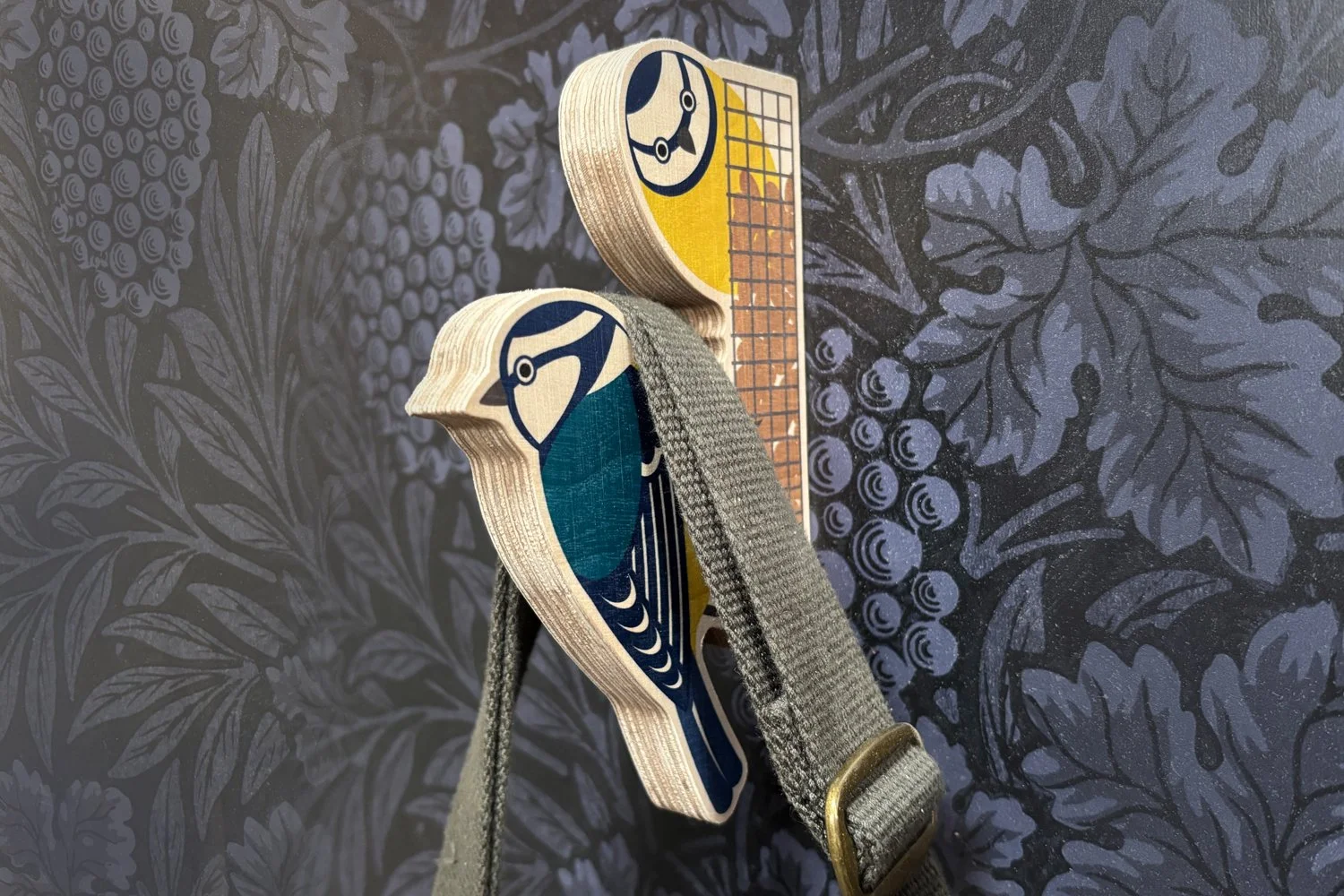 Blue tit with bag.jpg