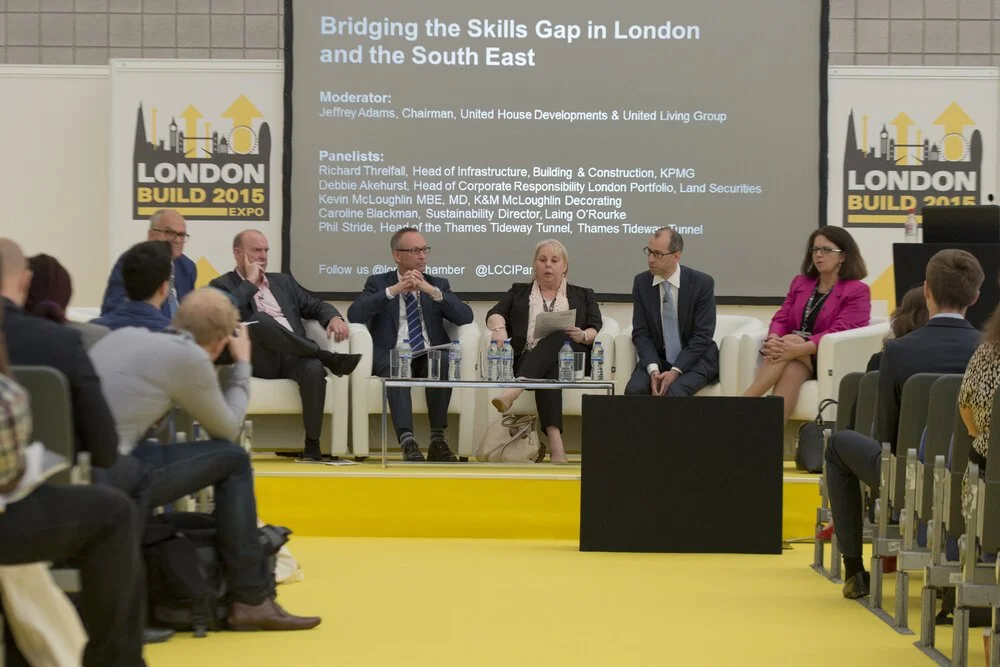 Panel discussion featuring experts discussing the future of the skills gap in south London, with an audience engaged in the conversation