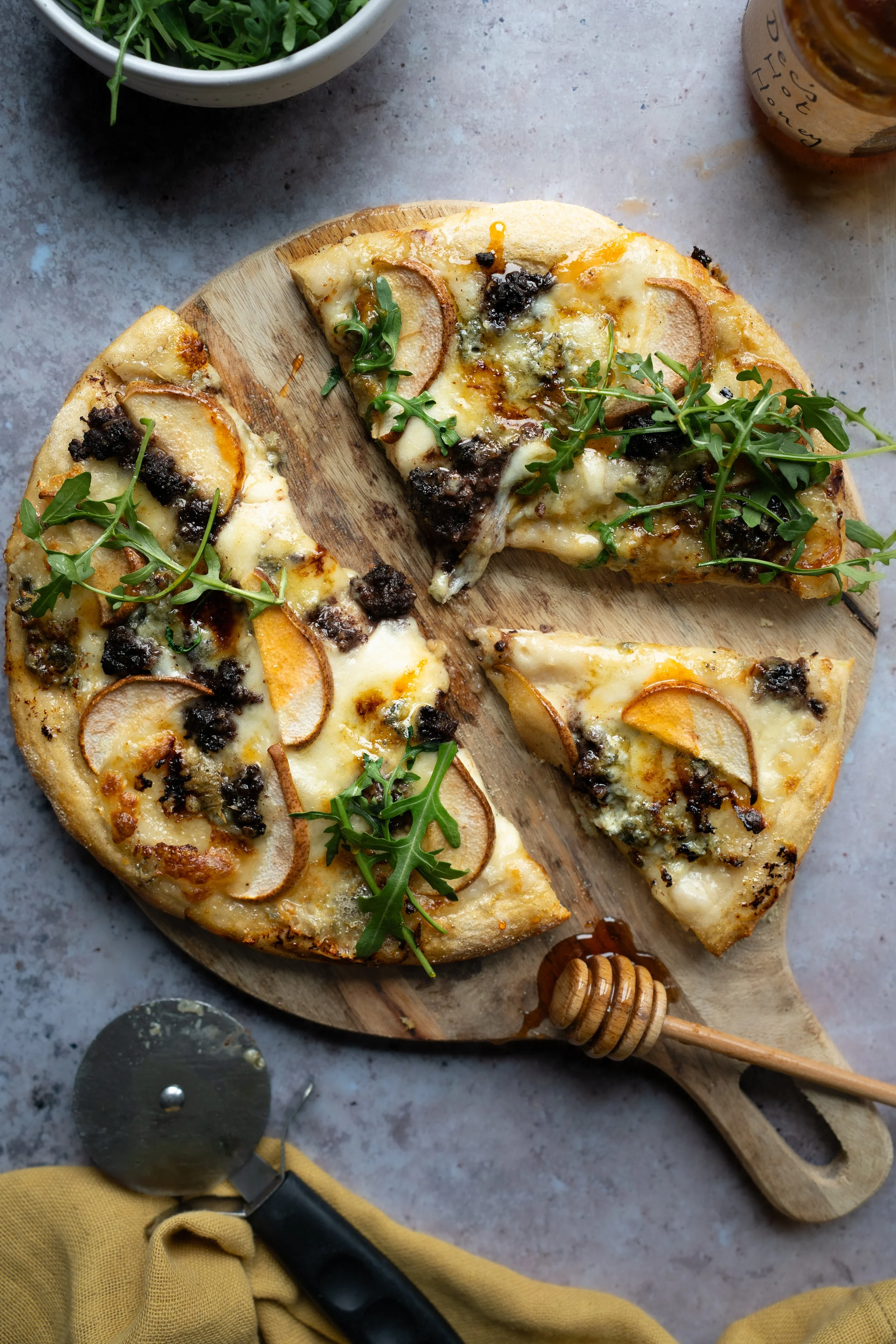 Cashel Blue Cheese Pizza with rocket. Photography by Loraine Cox Photography