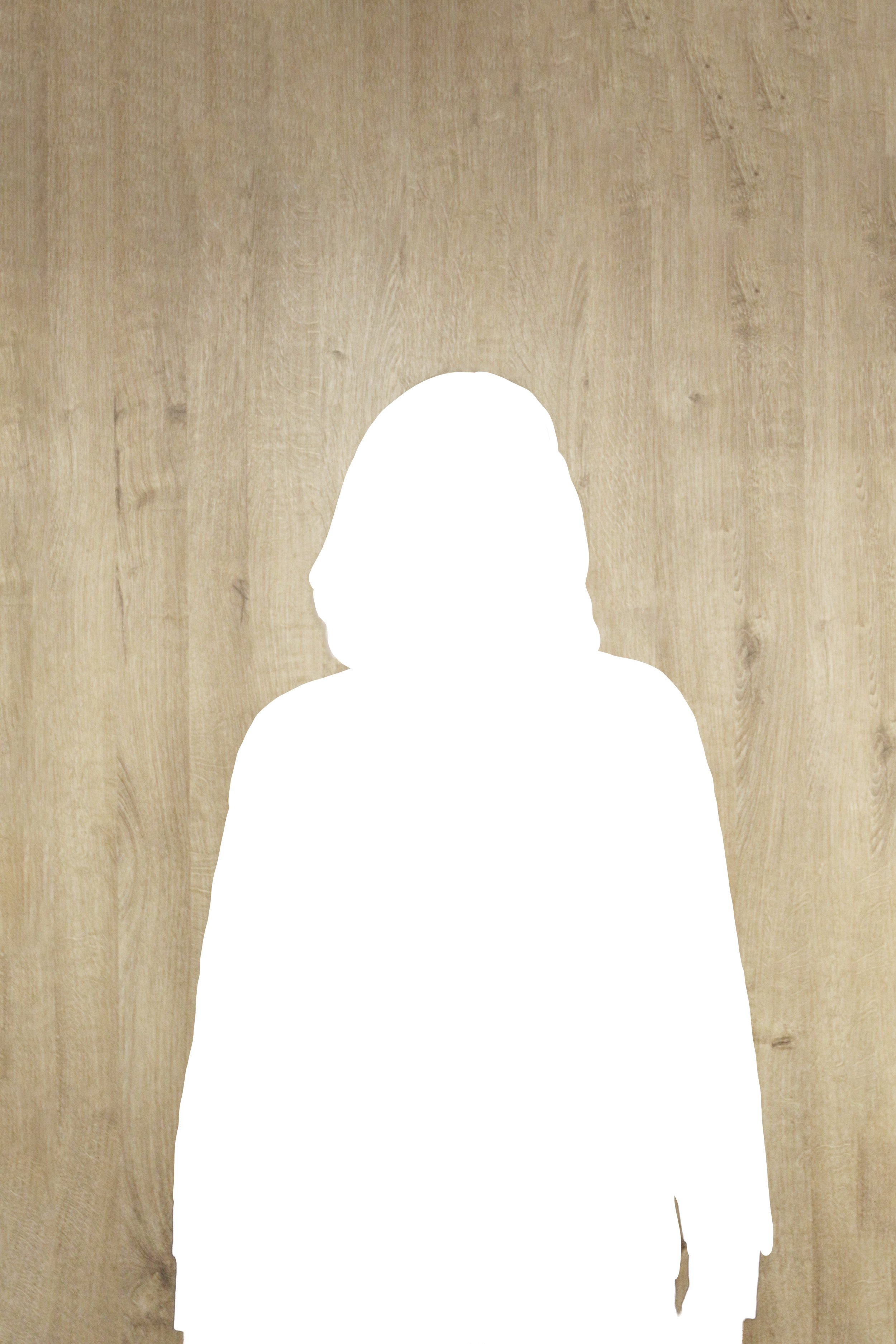 Silhouette einer Person vor einer Holzvertäfelung