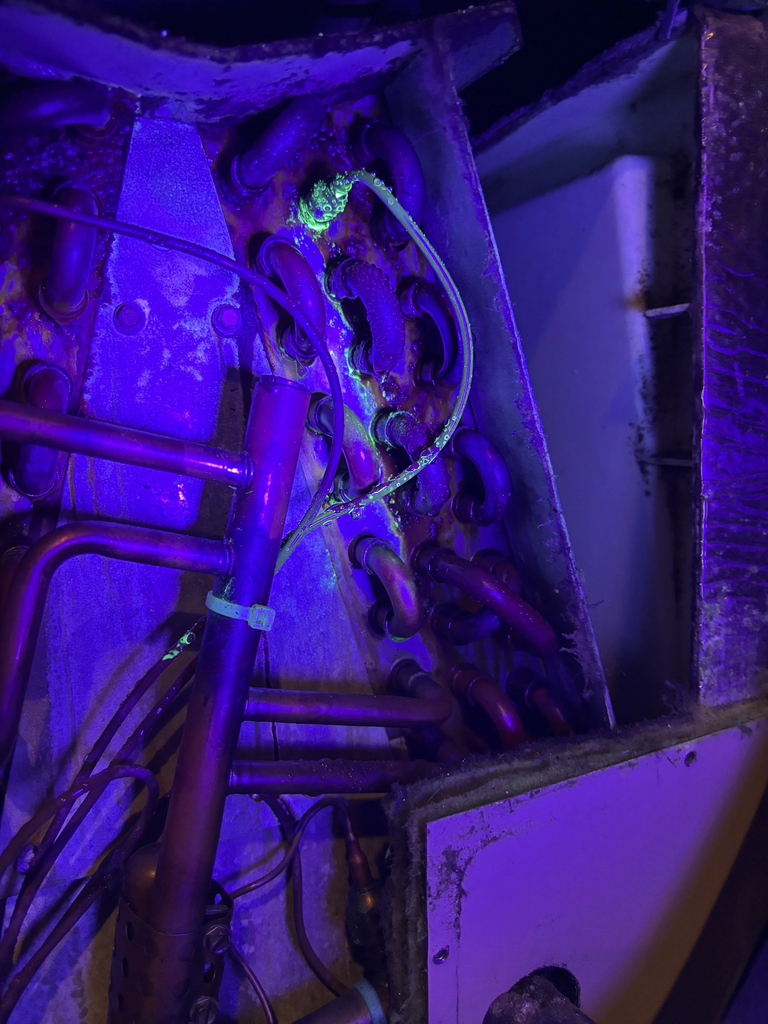 an image of an HVAC air conditioner leak search, this air conditioner is leaking freon