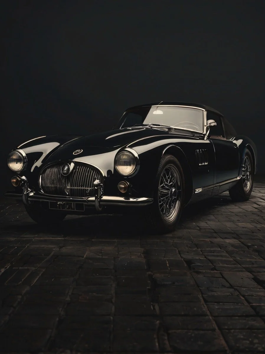 Classic Black Car on Cobblestone.jpeg