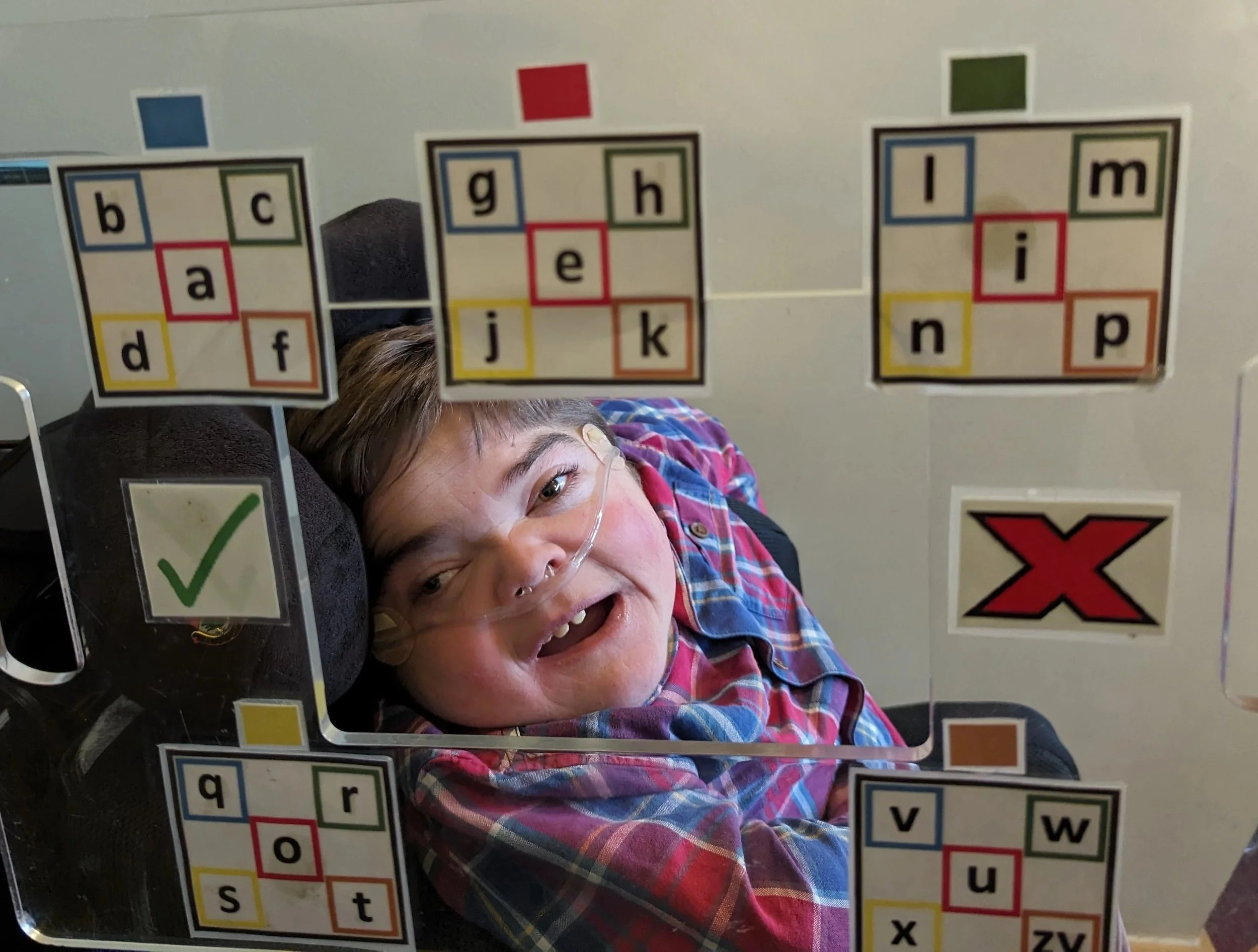 Jonathan Bryan looking through his spelling board