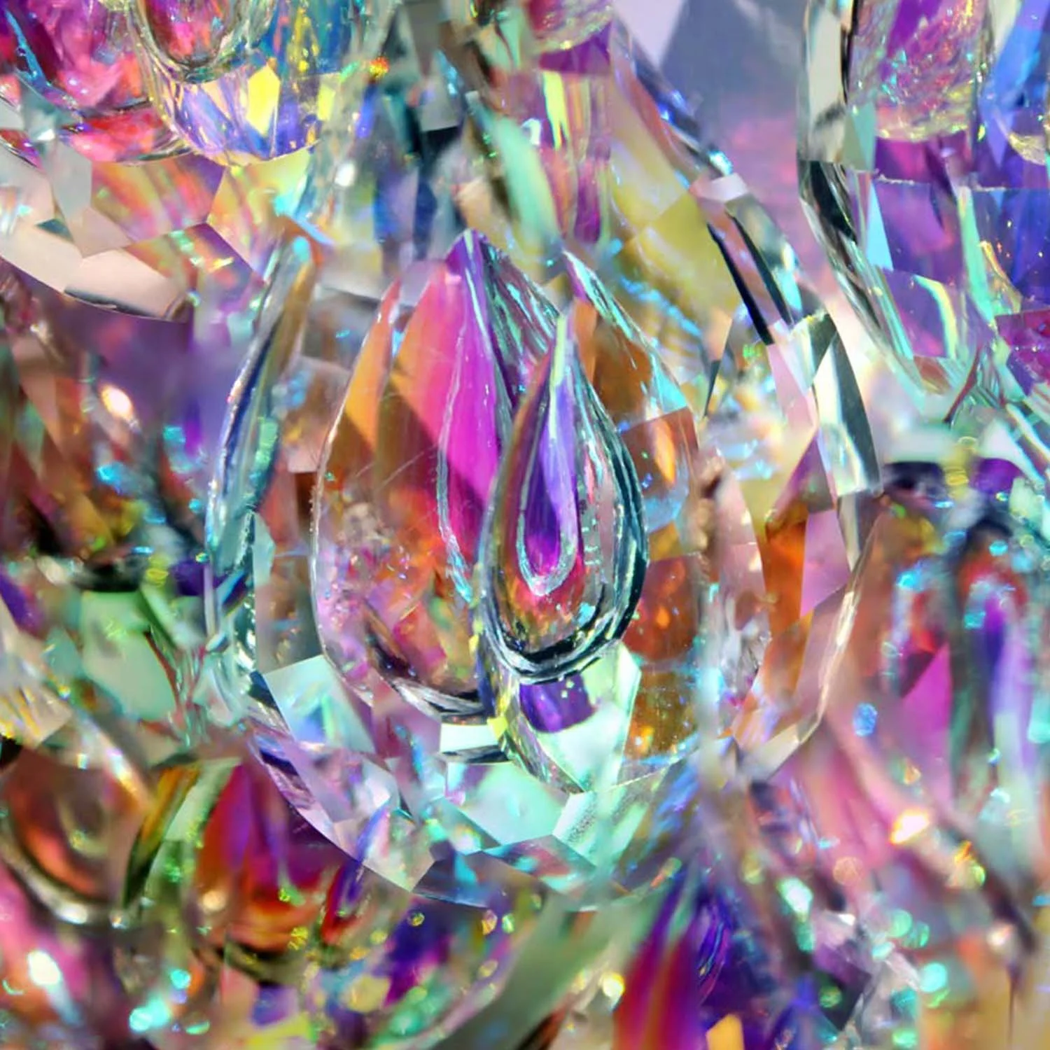 LUX MEDICINA 9 series, 2022: a large crystal teardrop in magenta, violet and gold, with teal light fracturing across its facets