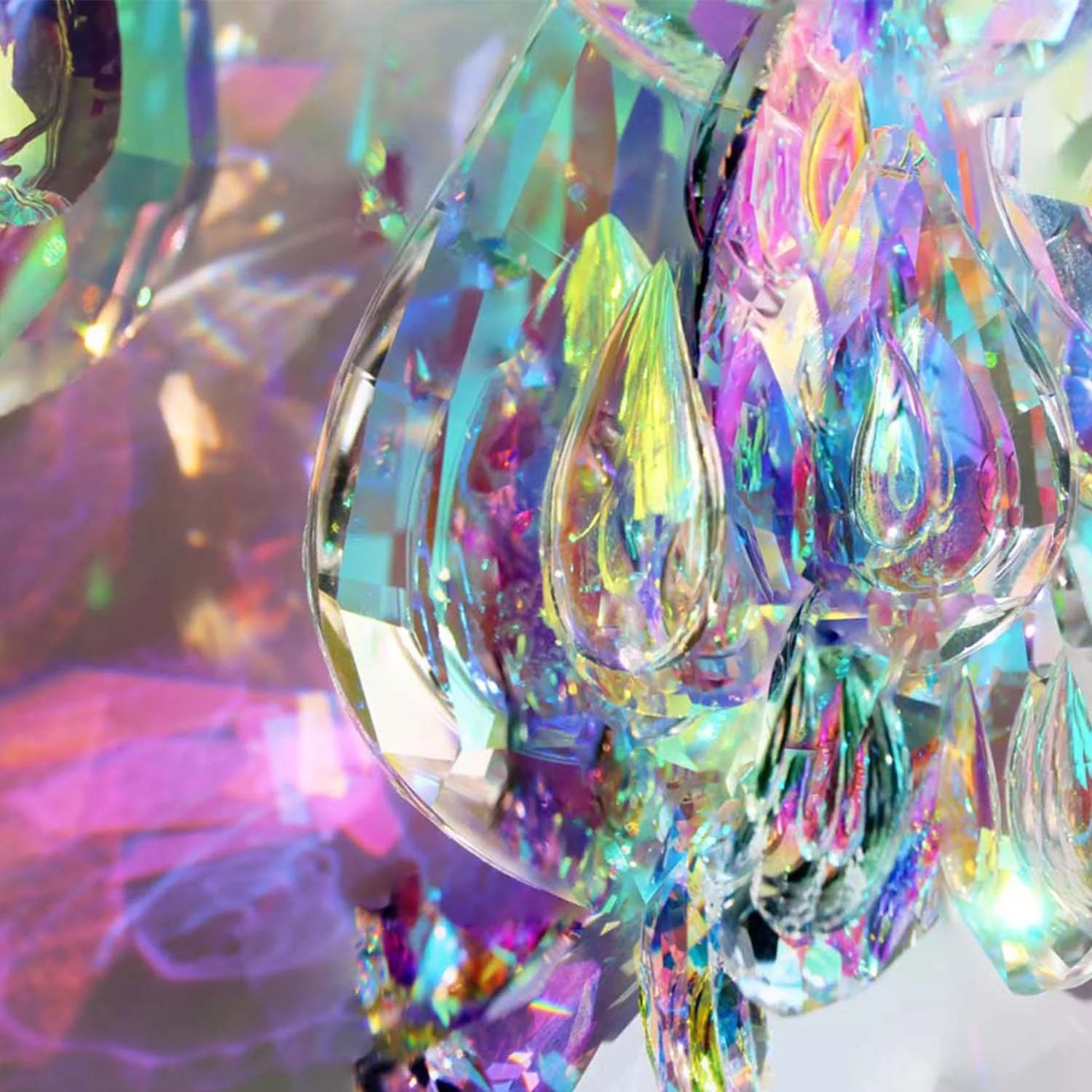 LUX MEDICINA 9 series, 2022: a cluster of glass teardrops glowing in cyan, pink and yellow-green against deep violet