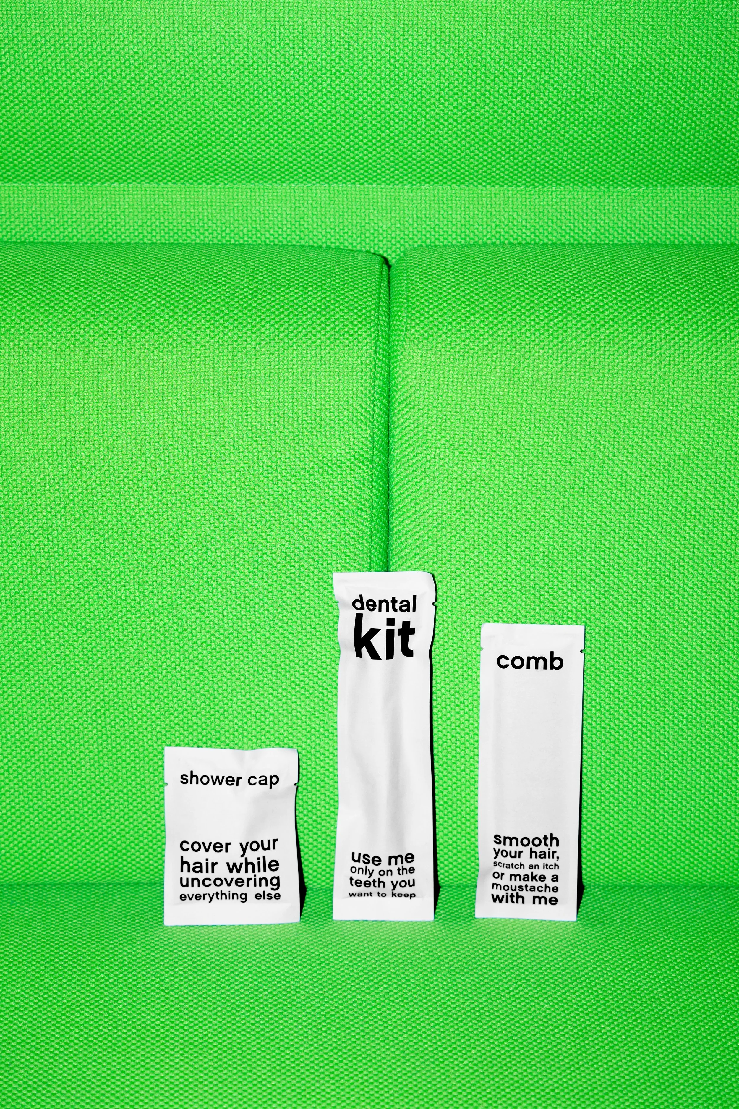 Amenities_ShowerCap-DentalKit-Comb copy.jpg
