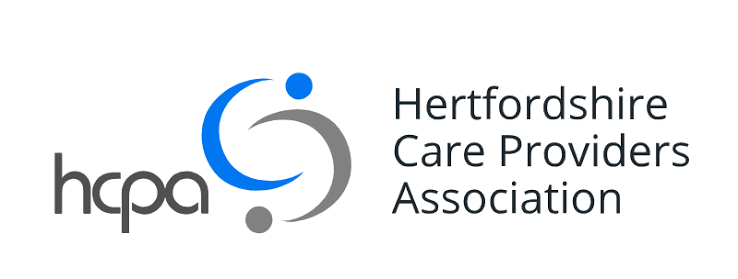Logo of the Hertfordshire Care Providers Association featuring the text and a stylized graphic with blue and gray elements.