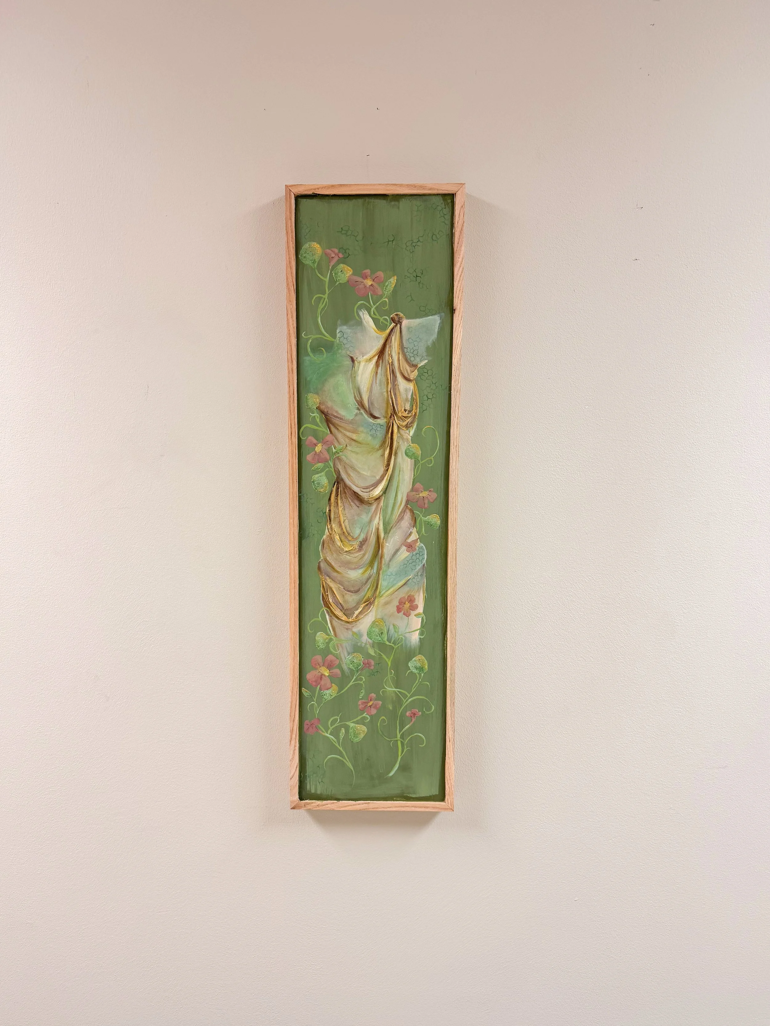 Vertical framed painting depicting a draped fabric on a green background with pink flowers and green vines.