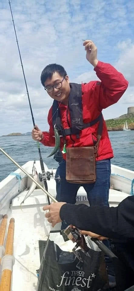 Tai catching fish.jpg