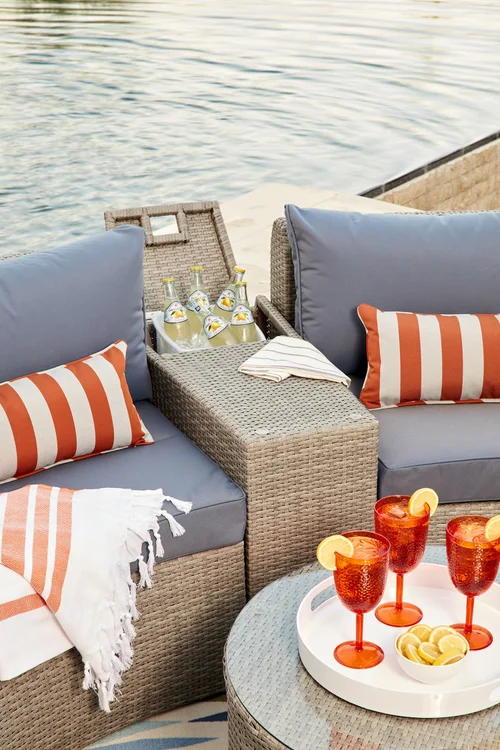 Poolside patio furniture setup before retouching
