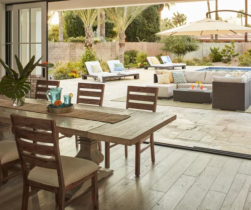 Dining room with exposed ceiling tracks before retouching