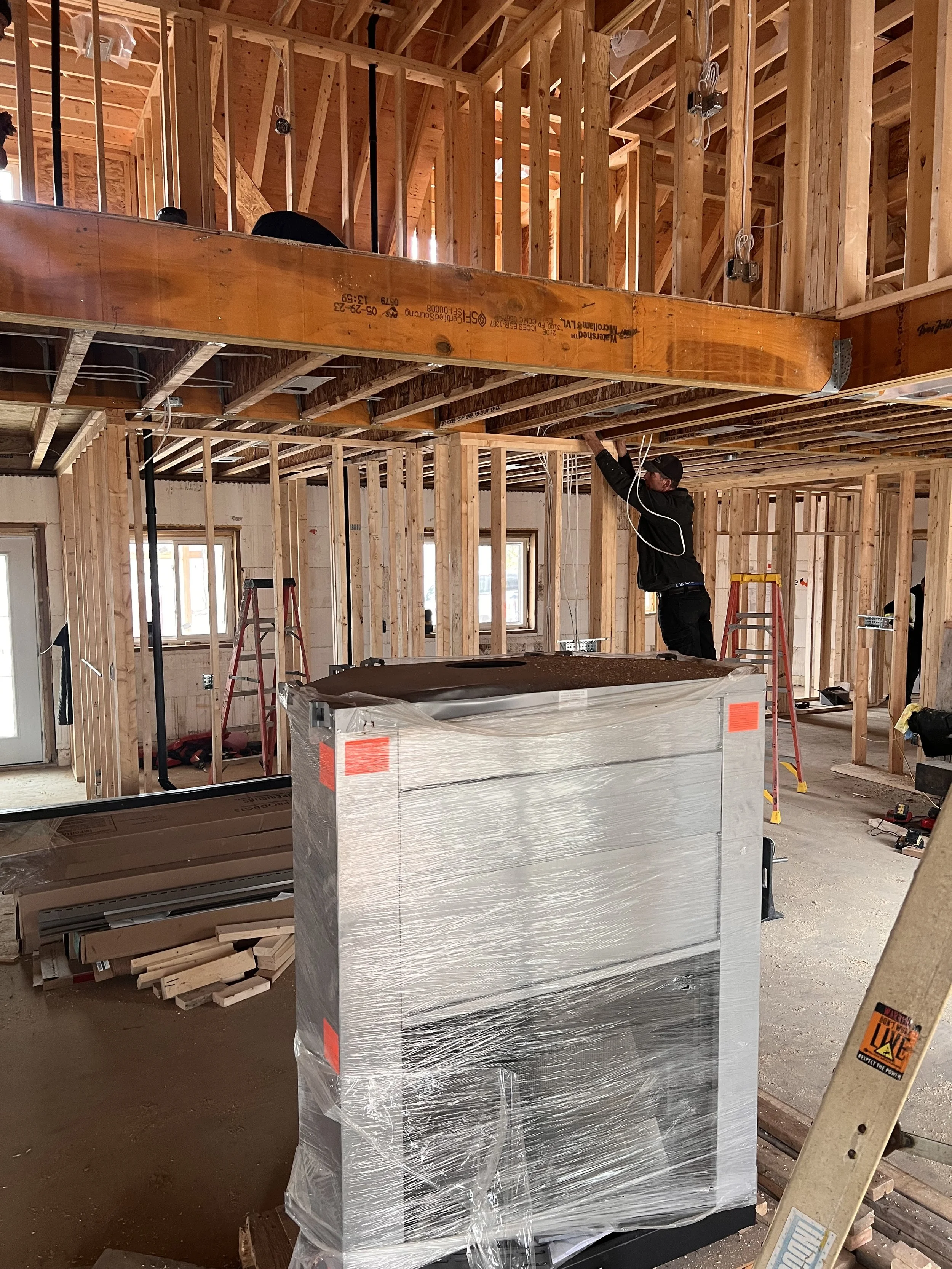 Electrician at work in new build.