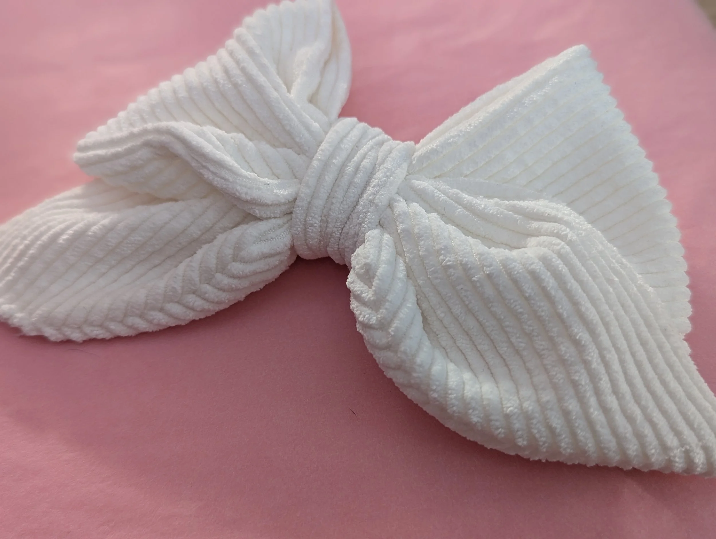 🎀 Nœud Multiposition – L’accessoire à clipser partout