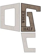 A logo featuring a stylized beer mug with the words 'Whole', 'Half', and 'Draft' inside it