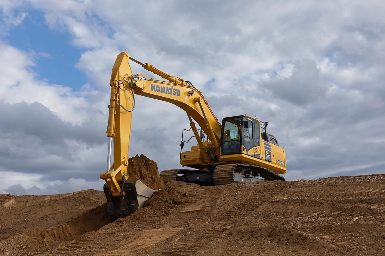 Komatsu and the Art of Distributed Scale