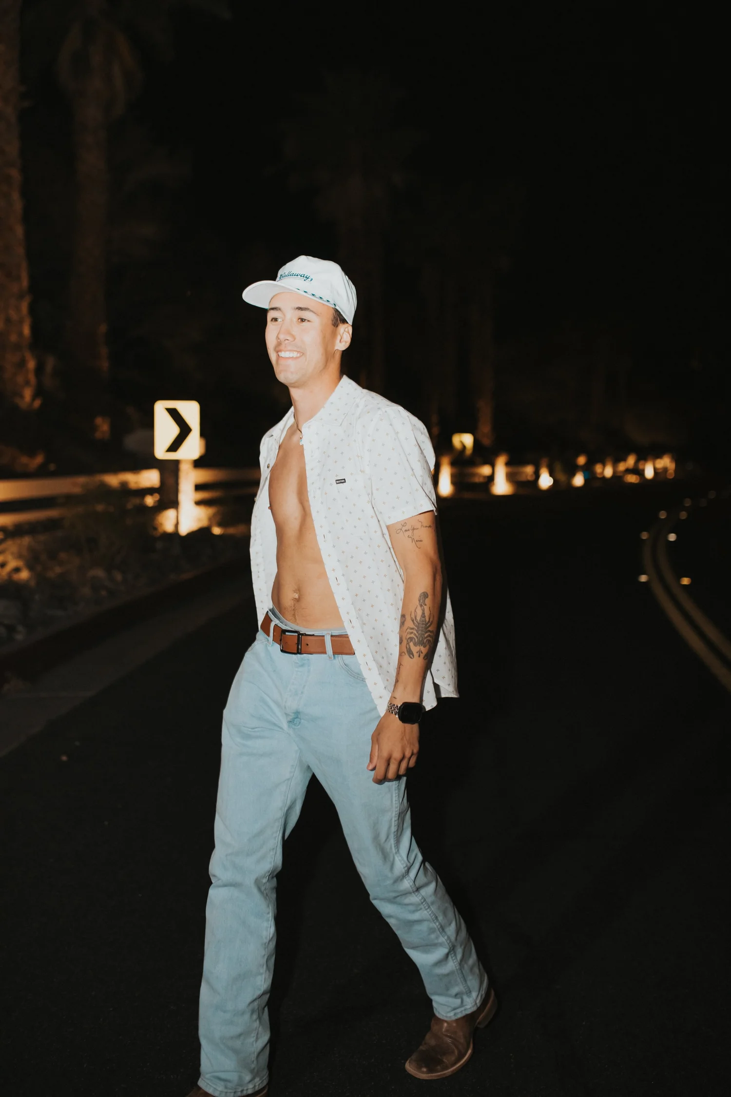 Isaak Rowe walking outside at night