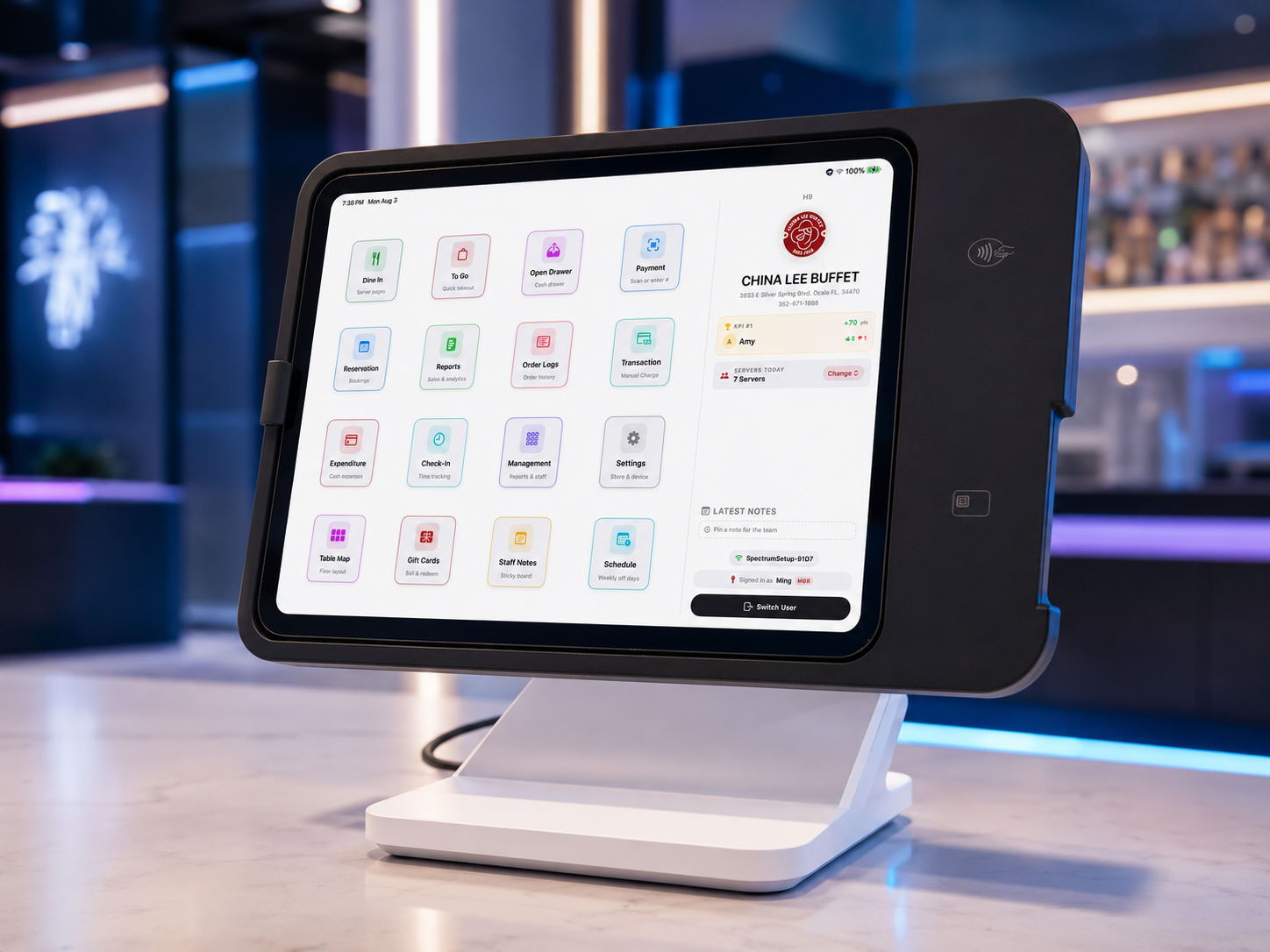 A restaurant order management touchscreen monitor displaying various menu and management options.