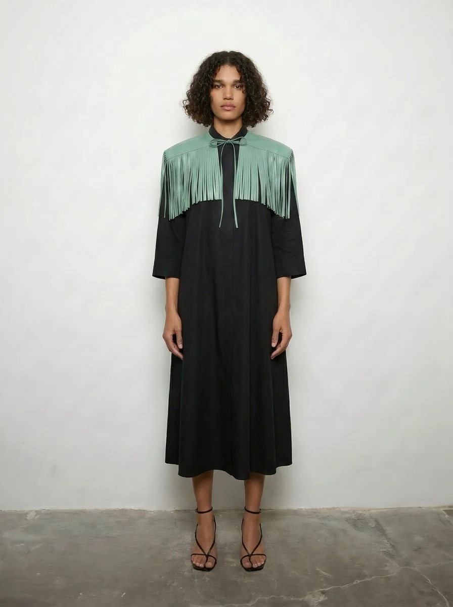 Mint green leather mini cape look.png