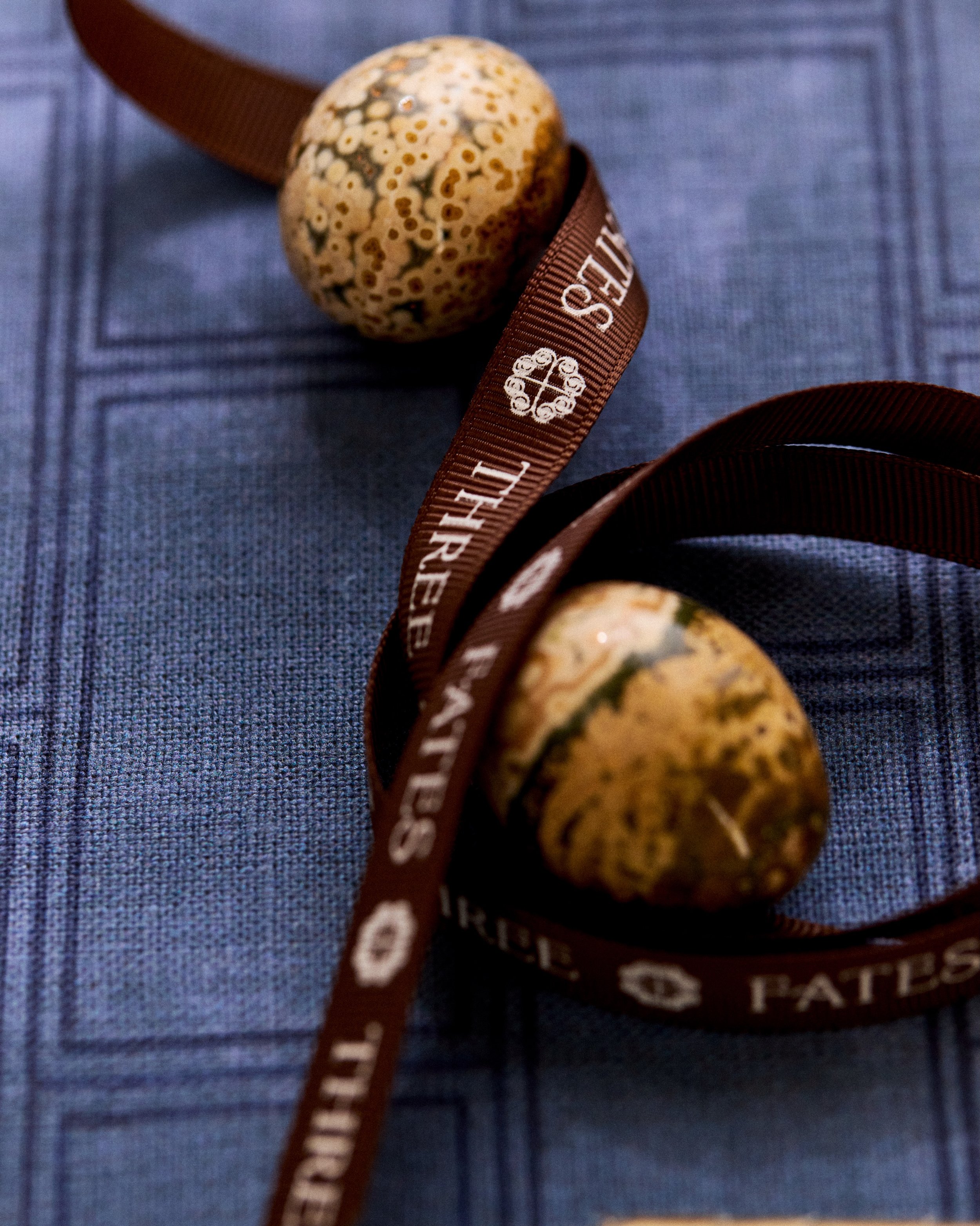 Tiny worlds, tied up in grosgrain.