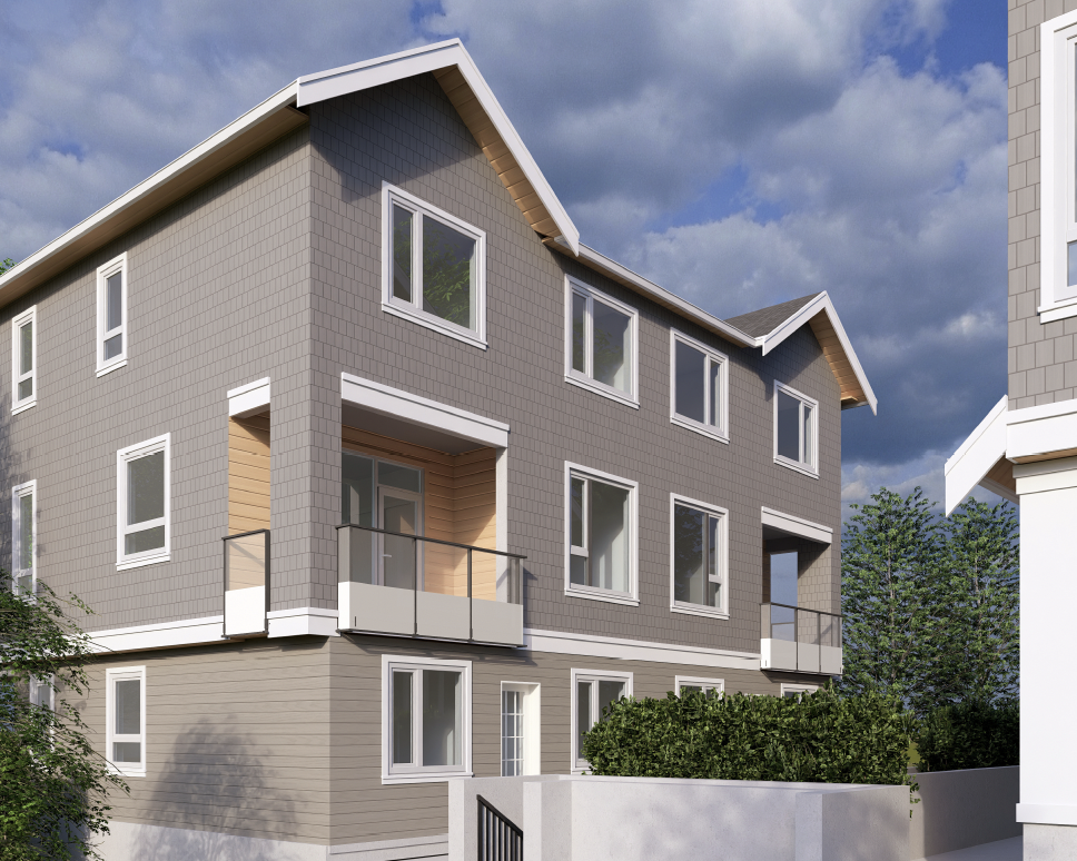 A modern multi-story residential building with gray and beige siding, white window frames, and small balconies, under a partly cloudy sky.