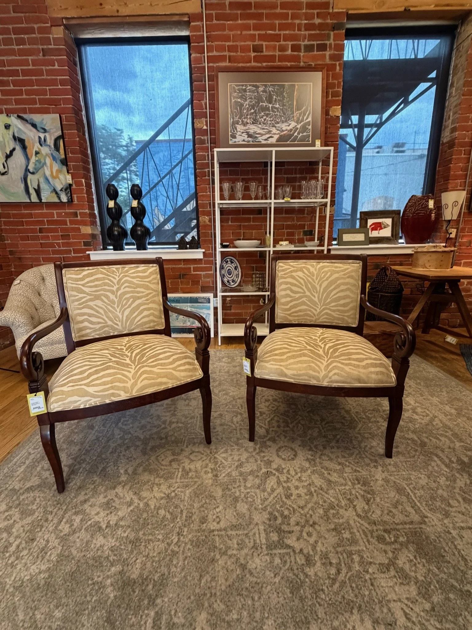 Mahogany armchair with neutral zebra pattern