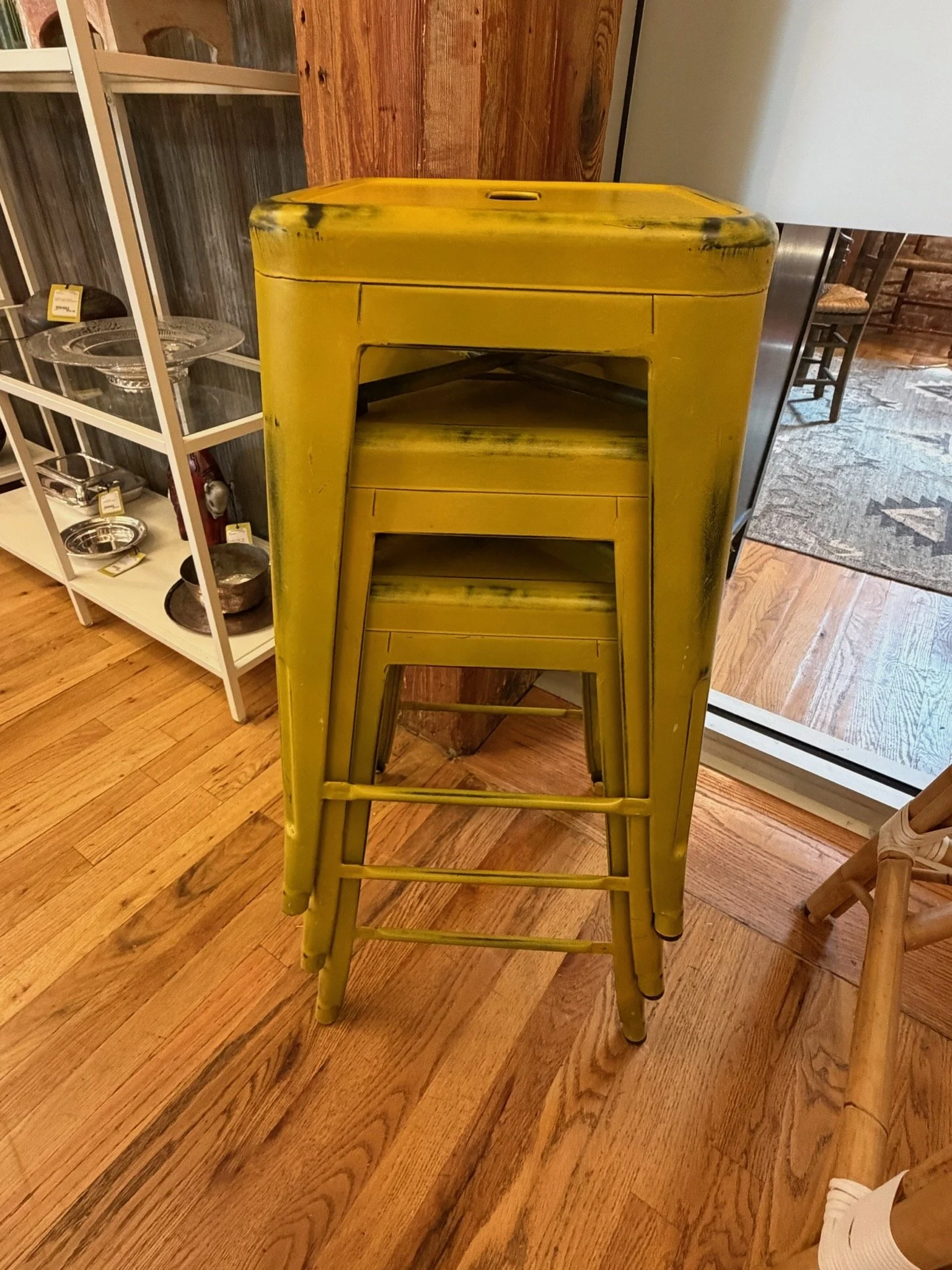 Yellow stackable metal stools