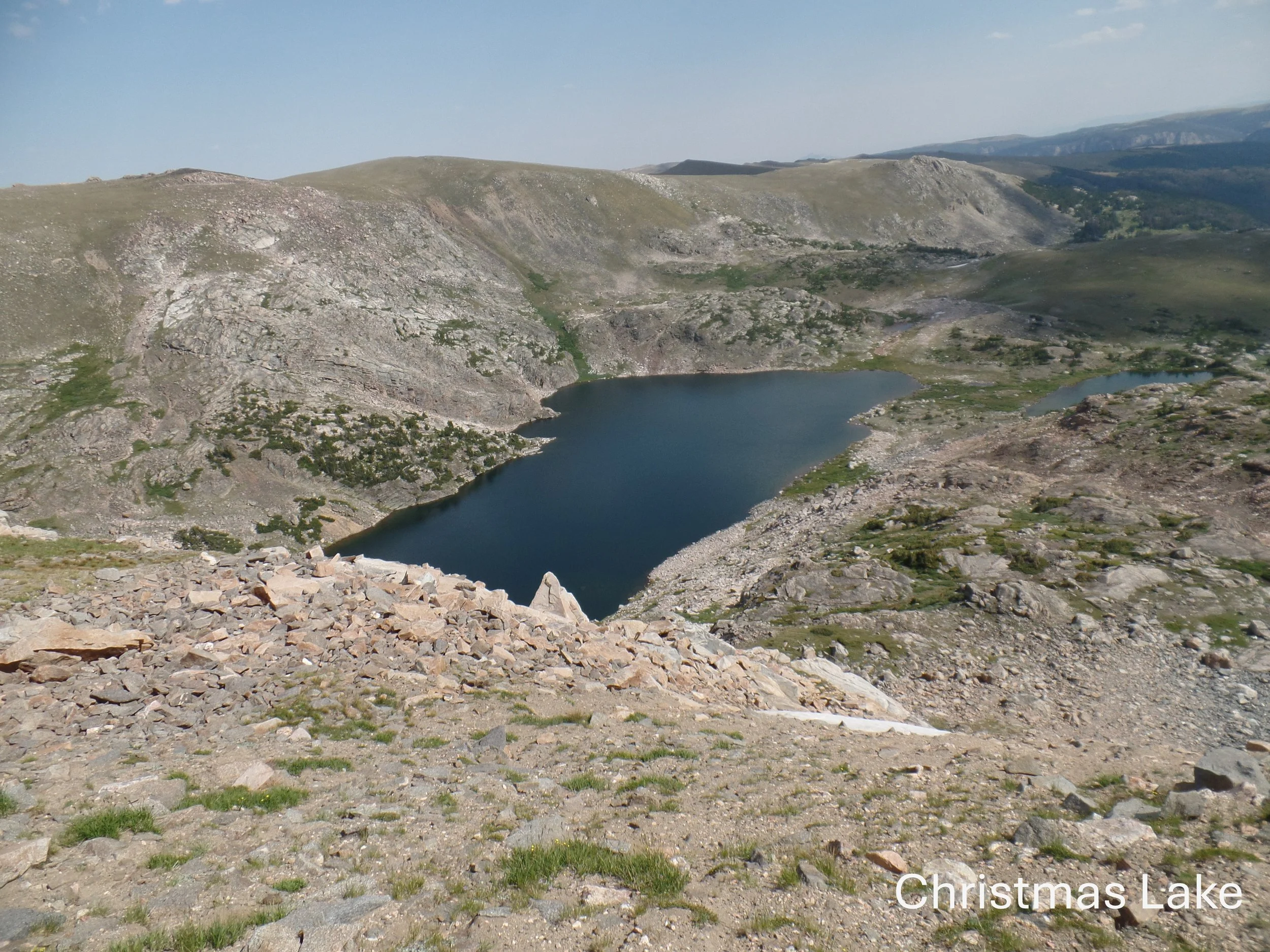 Mountain landscape with Christmas Lake and rocky terrain