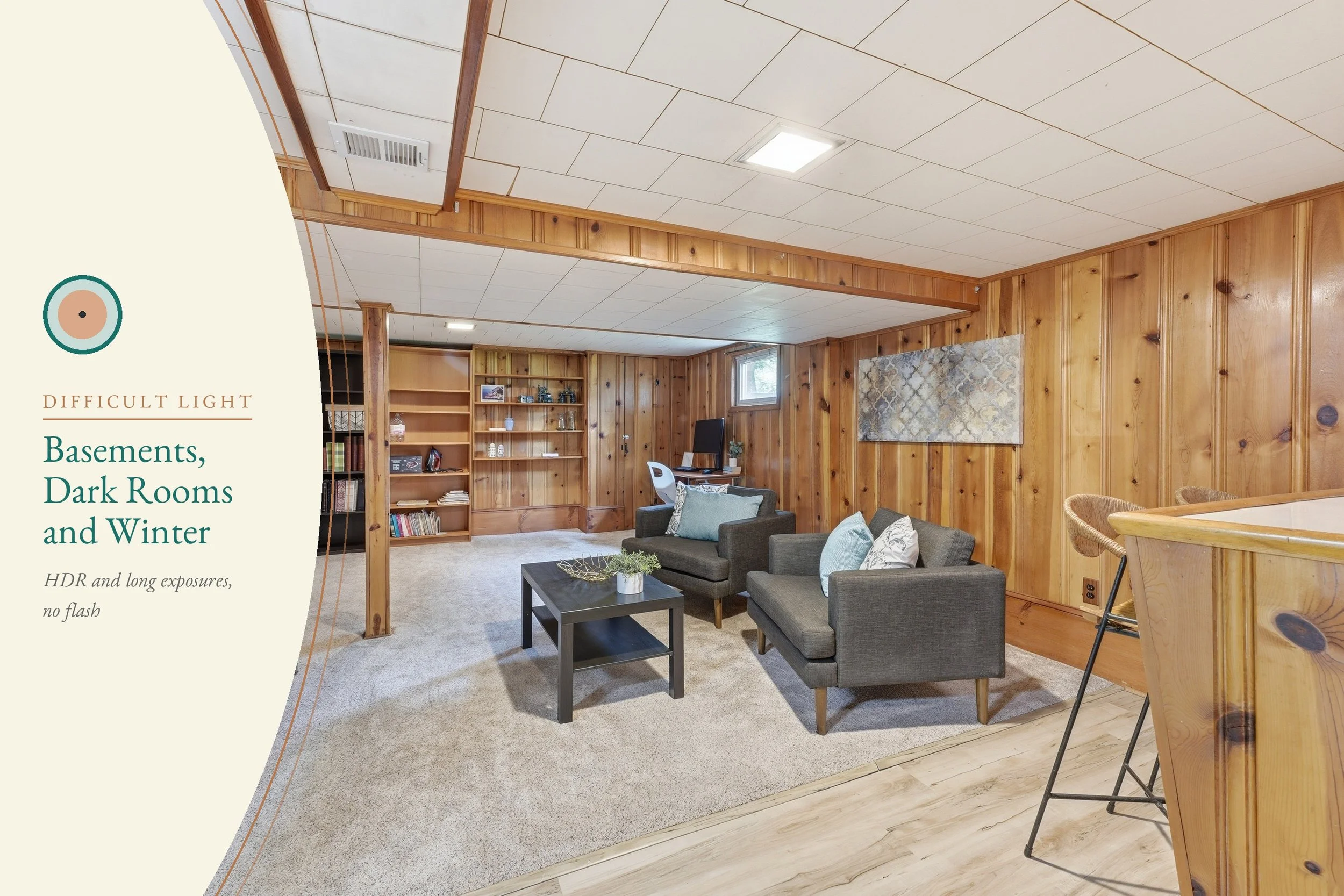 A knotty-pine paneled basement rec room with two gray armchairs, a coffee table, built-in bookshelves, a desk under one small window and a bar at right, with the title Basements, Dark Rooms and Winter.