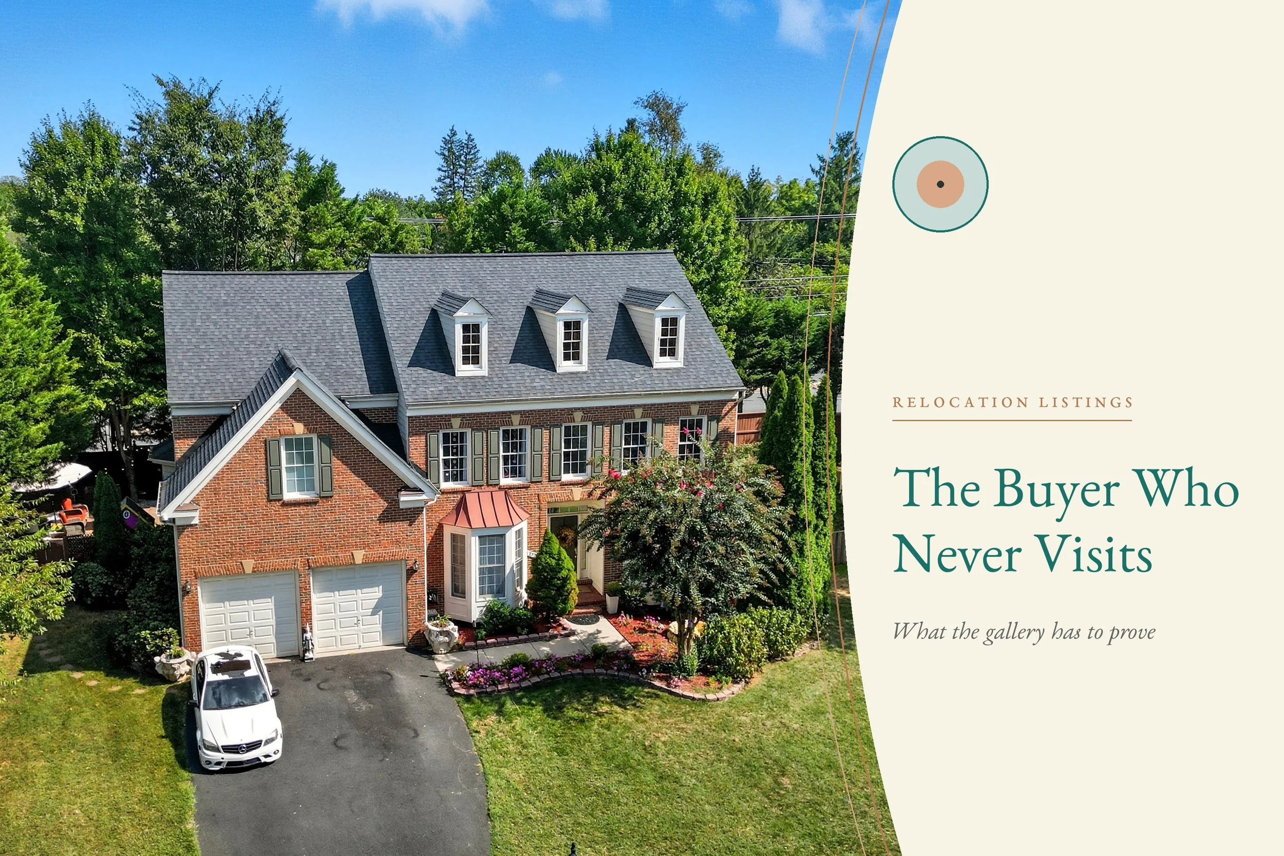 Elevated view of a brick colonial with three dormers, a copper-roofed bay window, and a landscaped front walk on a clear day.