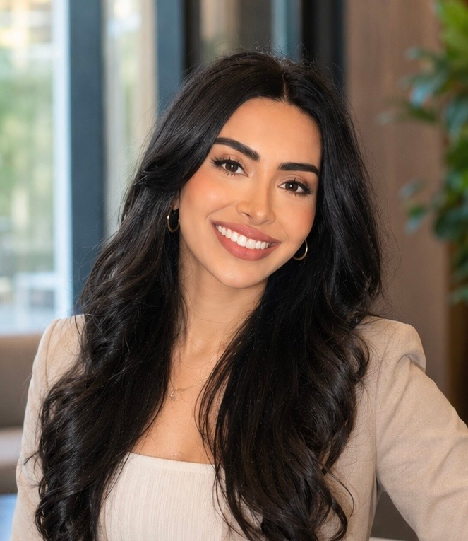 Dr. Tina Halabian, PsyD, licensed clinical psychologist, smiling in a beige blazer