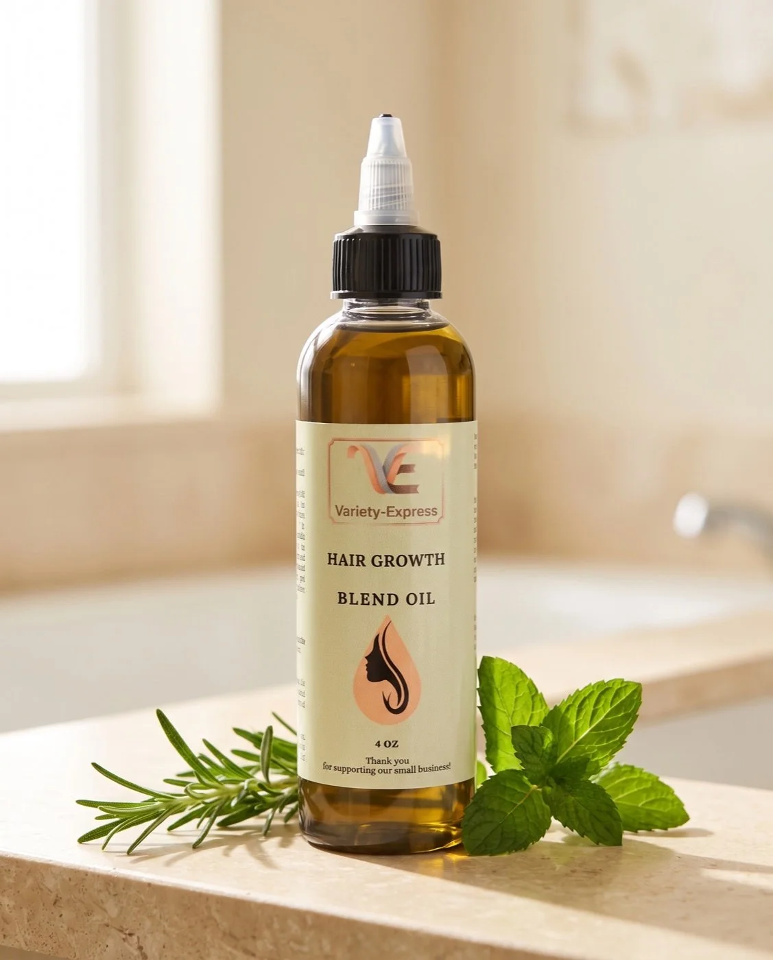 hair-growth-oil-4oz-rosemary-stone-counter.jpg