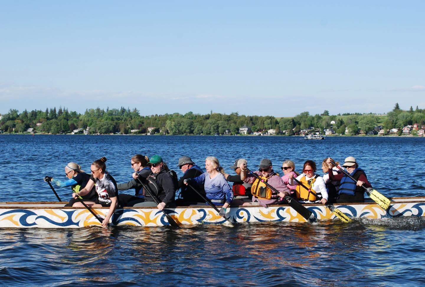 What does rural Pride look like? Sometimes, it looks exactly like this.

Last Friday, the Scugog Dragon Boat Club had their monthly Karma Paddle fundraiser event, which brought people to the lakefront in Port Perry. Together, this incredible group pa
