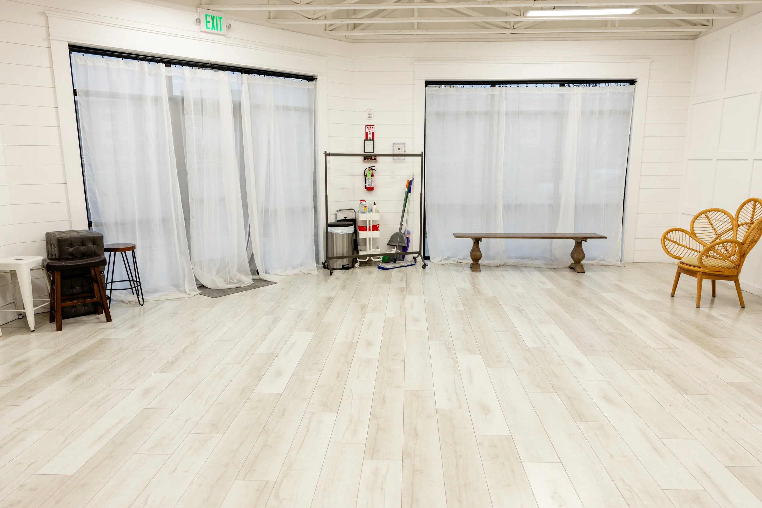 Studio A at Varsa Studios, located inside Blank Space in American Fork, Utah, features expansive floor to ceiling windows with sheer curtains that create beautiful soft natural light all day long. This bright and airy natural light studio in Utah Cou