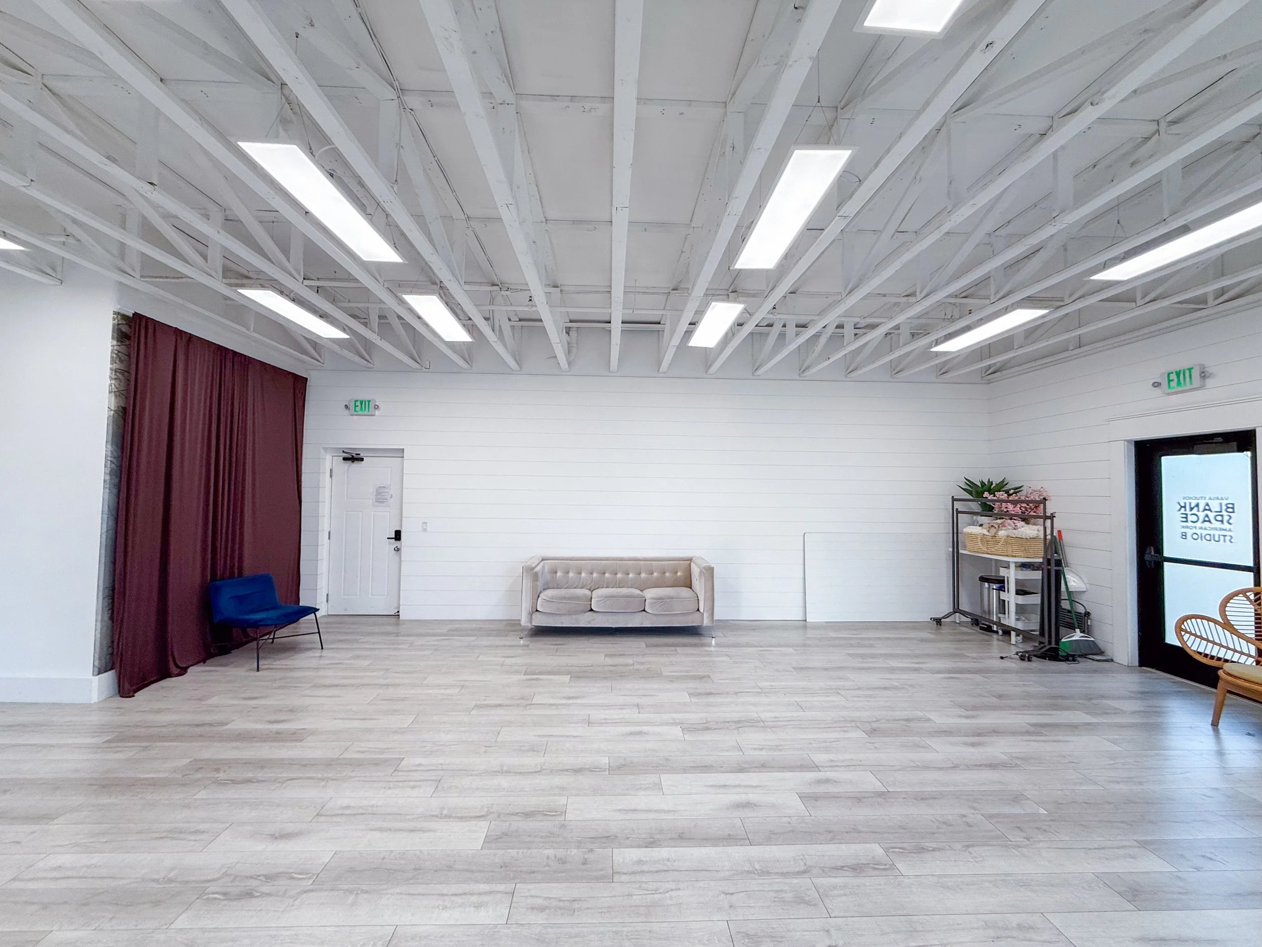 Open-concept natural light studio with multiple styled sets, movable backdrops, and flexible shooting space. Perfect for branding sessions, video production, commercial photography, workshops, content creation, product photography, and social media c