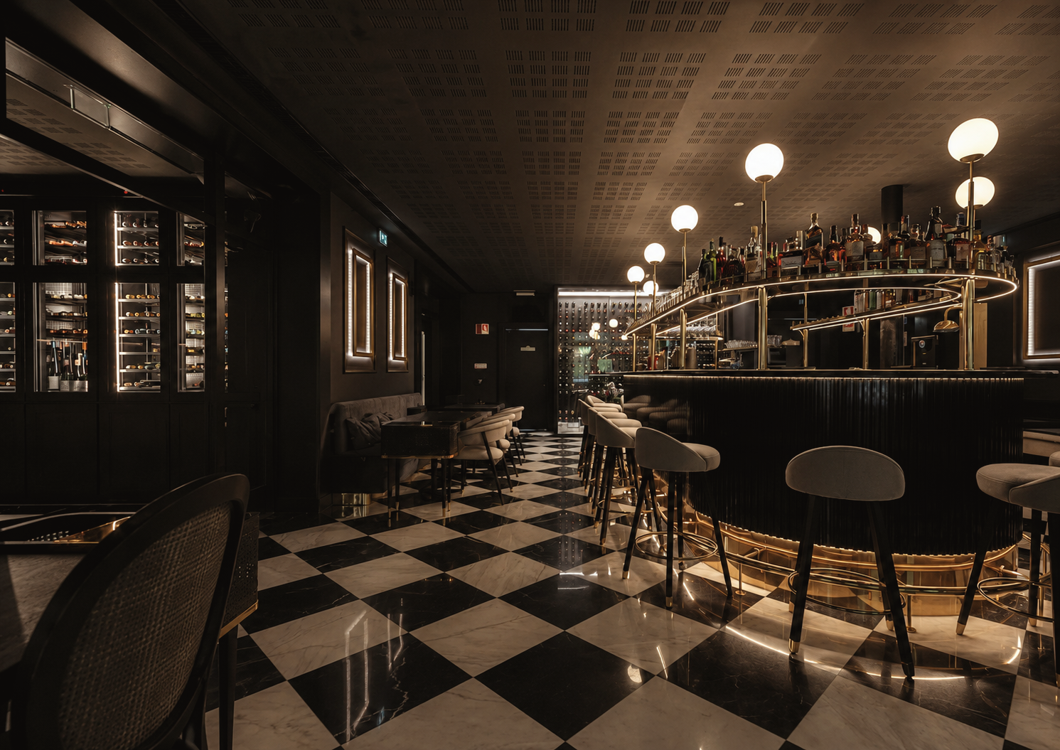 Blind restaurant in Porto, Portugal, featuring a sophisticated dark interior, illuminated cocktail bar, checkerboard floor, and intimate fine dining atmosphere.