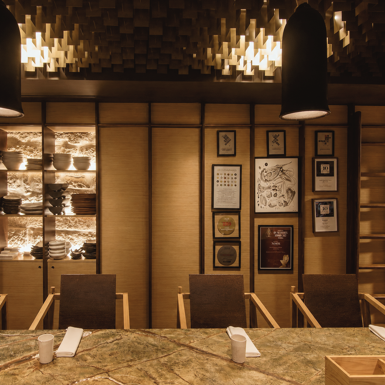 Euskalduna Studio fine dining restaurant in Porto, Portugal, featuring an intimate chef-led dining space with warm lighting, contemporary design, and an open-kitchen atmosphere.