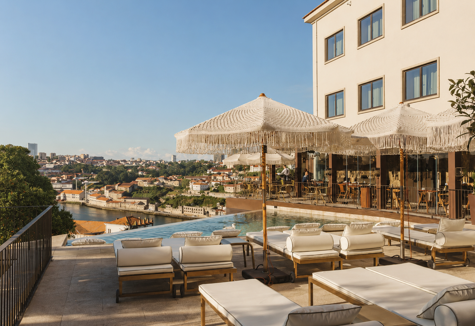 Torel Avantgarde luxury boutique hotel in Porto, Portugal, featuring an elegant outdoor terrace, lounge seating, and panoramic views over the city.