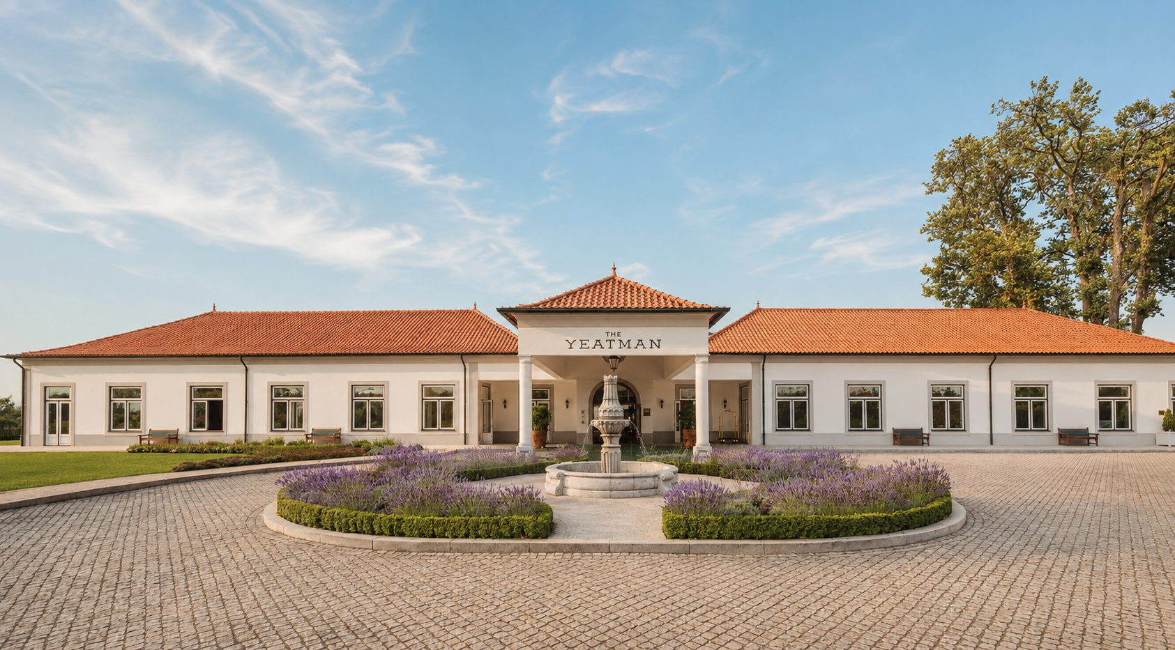 The Yeatman luxury wine hotel in Vila Nova de Gaia, Porto, Portugal, featuring its elegant entrance, landscaped gardens, and classic Portuguese architecture.