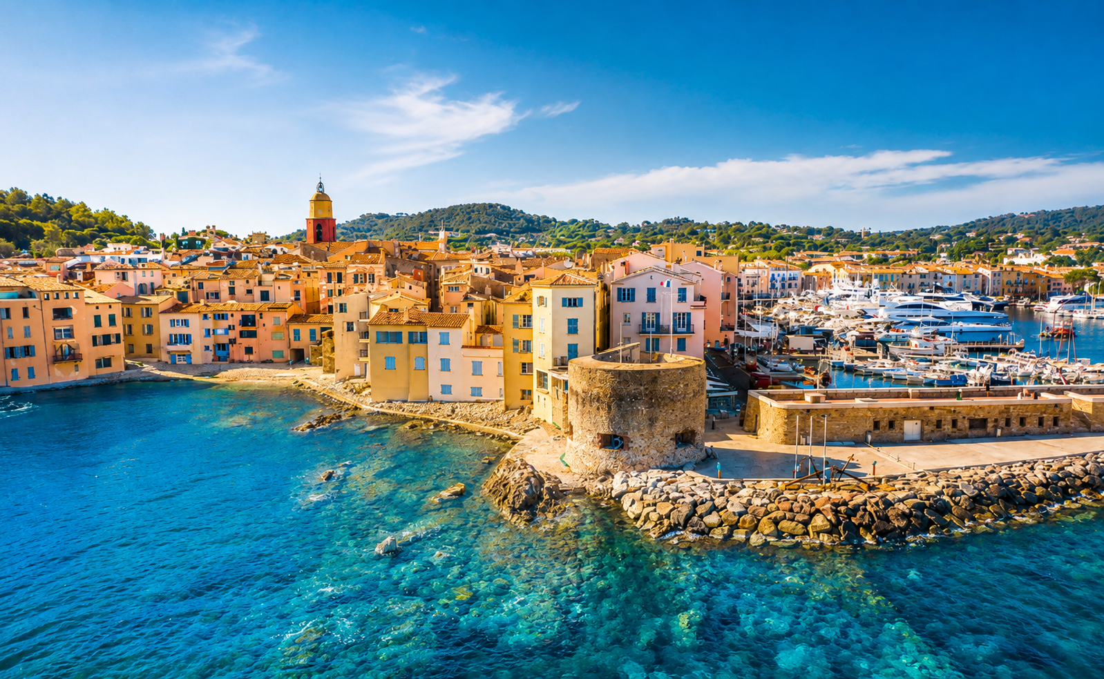 Colorful coastal village and marina along the Mediterranean Sea on the French Riviera
