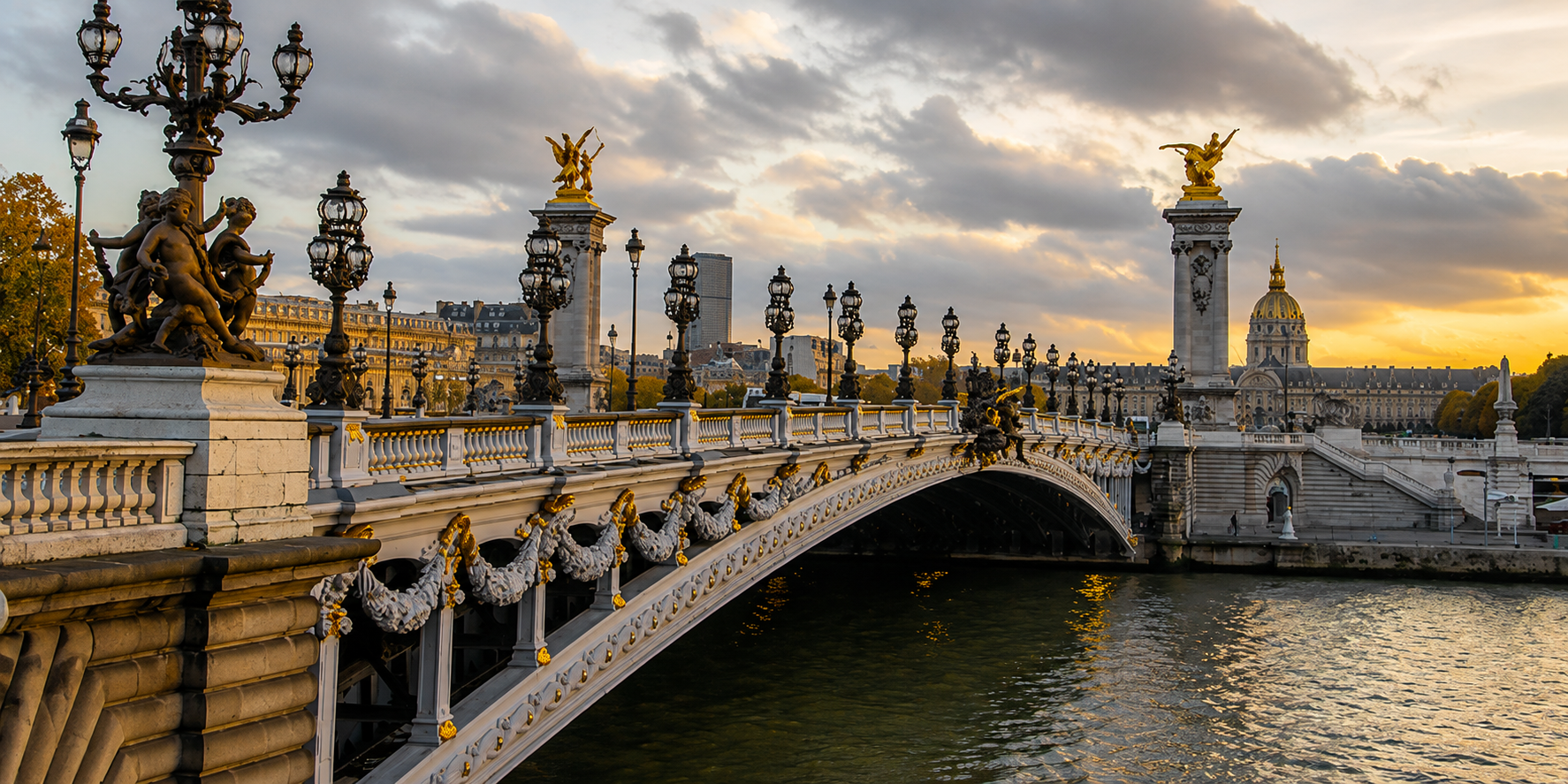 Pont Alexandre III in Paris, France, featuring ornate sculptures, gilded details, historic street lamps, and sunset views over the Seine River.