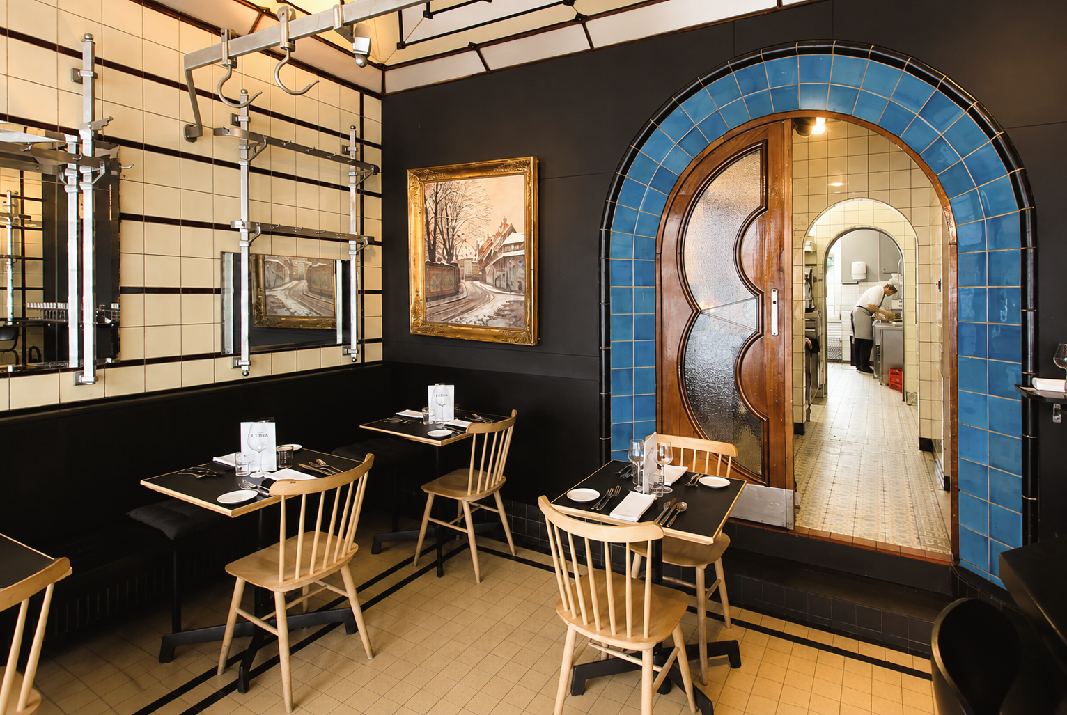 Intimate dining room at La Buvette, a neighborhood restaurant in Brussels